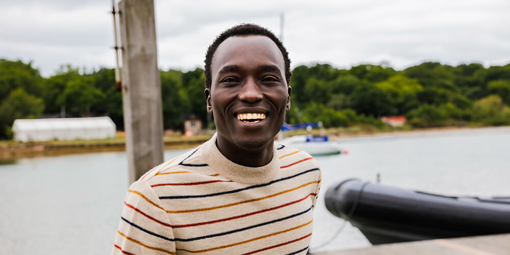 From the war-torn streets of Uganda to the London catwalks (via a building site or two), meet Dennis Okwera...
