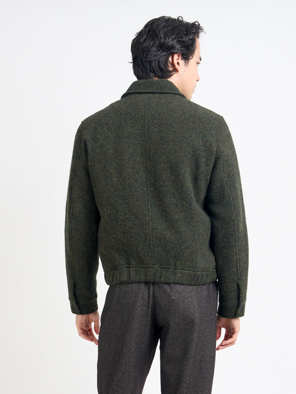 Close up back shot of model wearing Oliver Spencer Men's Green Wool Bomber Jacket