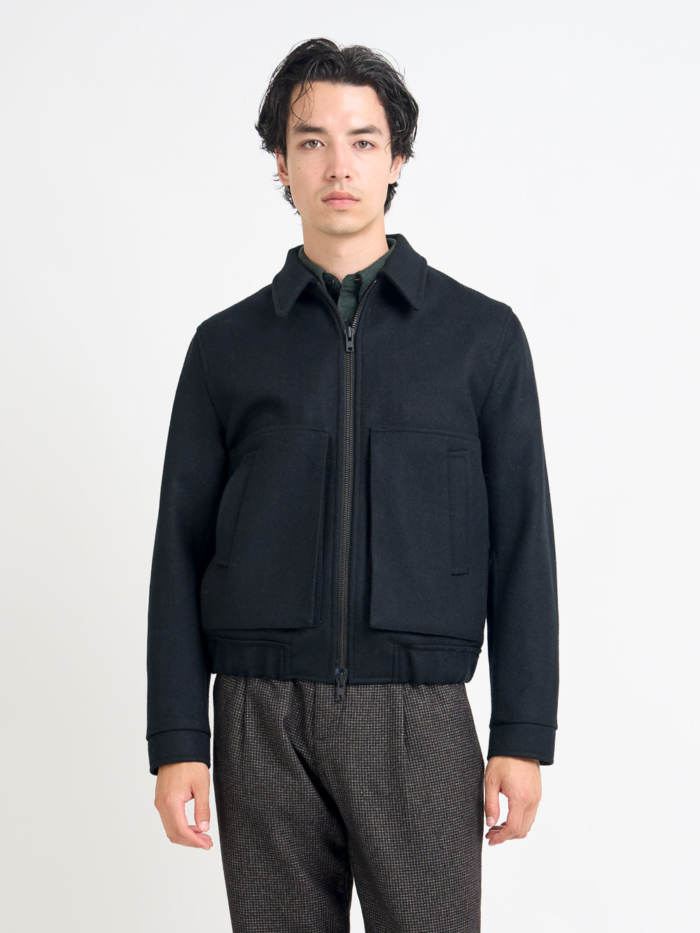 Close up shot of model wearing Oliver Spencer Men's Black Wool Bomber Jacket