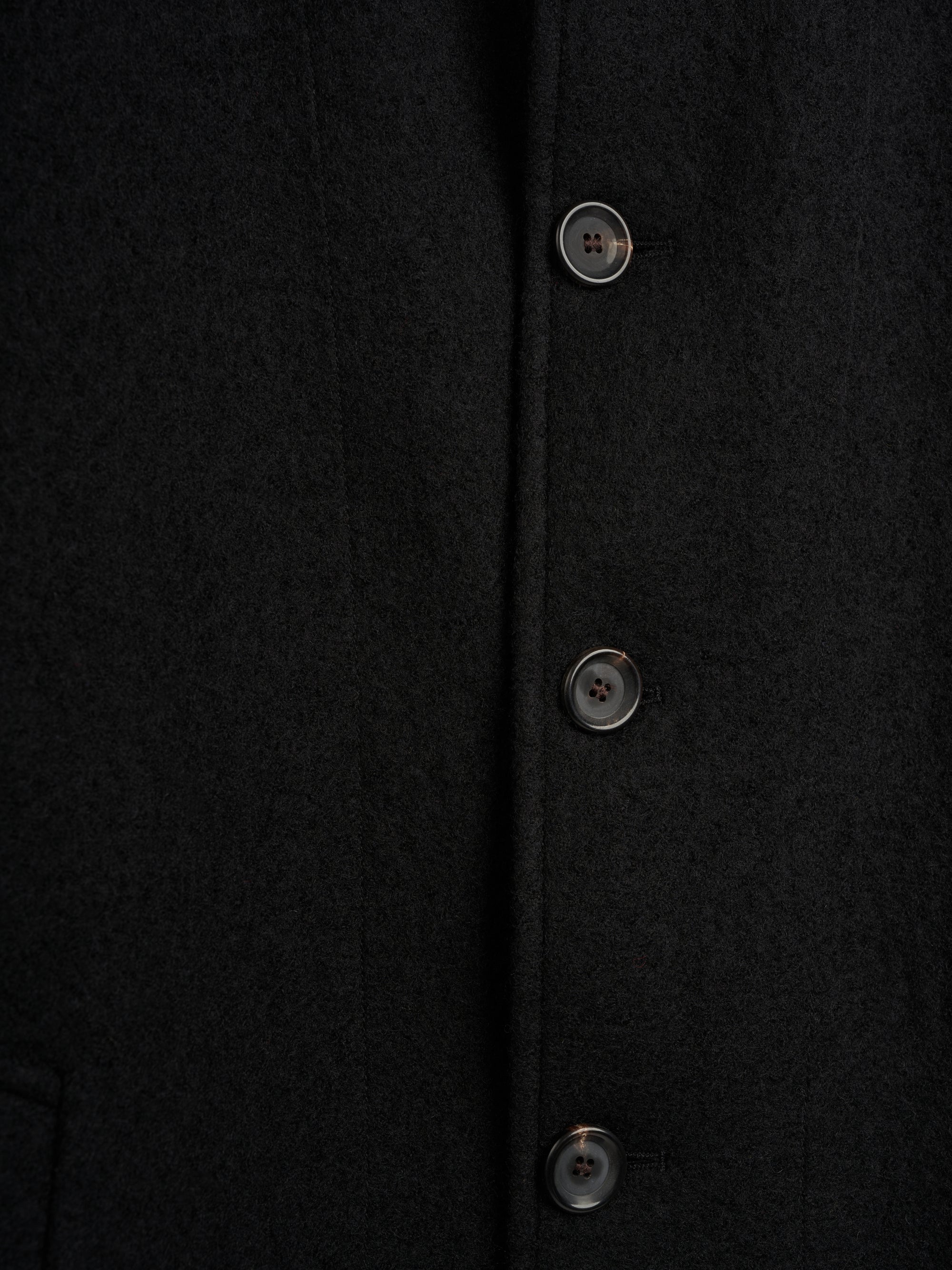 Detailed button shot of Oliver Spencer Men's Black Wool Car Coat