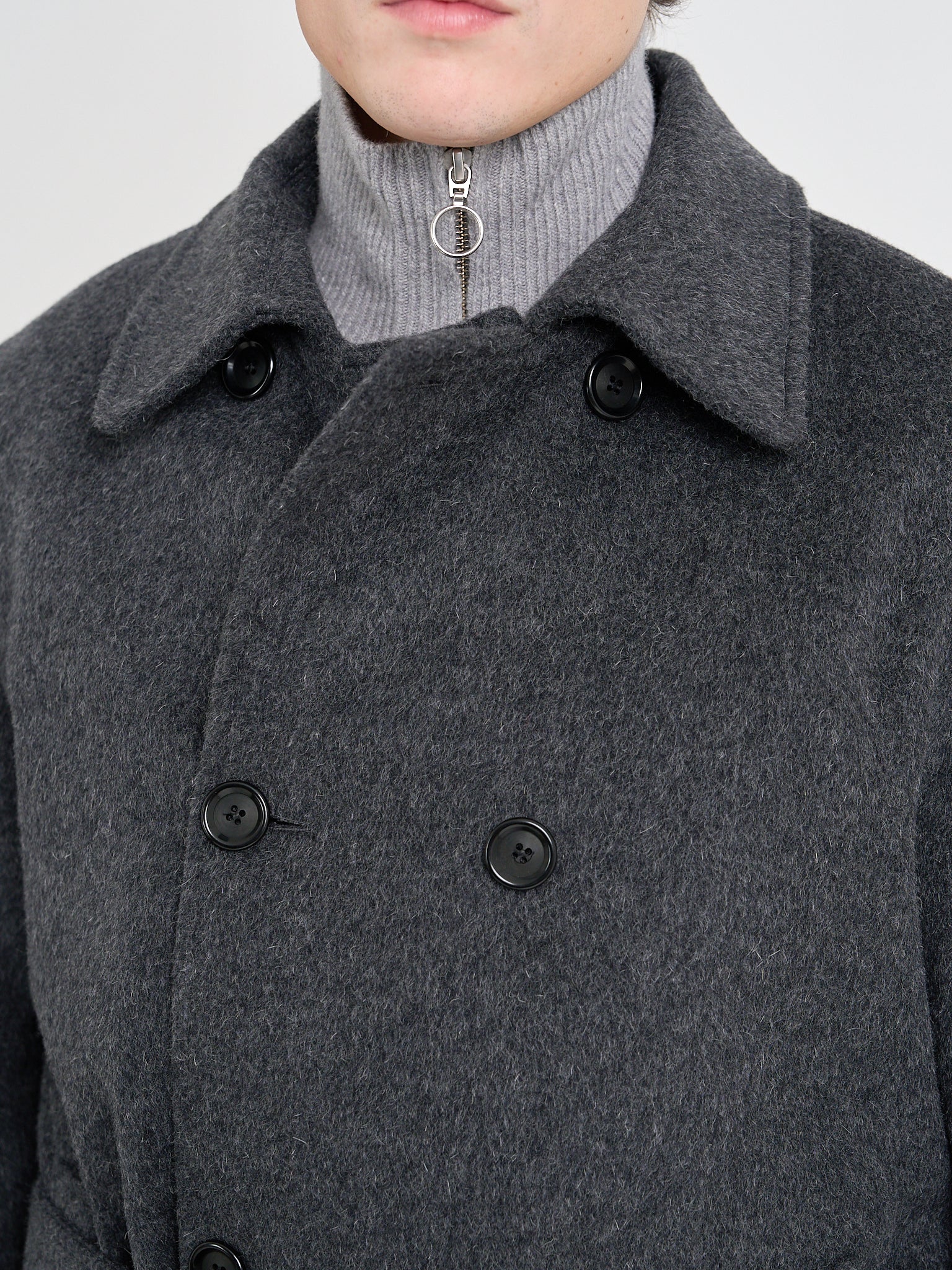 Close up collar shot of model wearing men's Charcoal Recycled Wool And Mohair Trench Coat