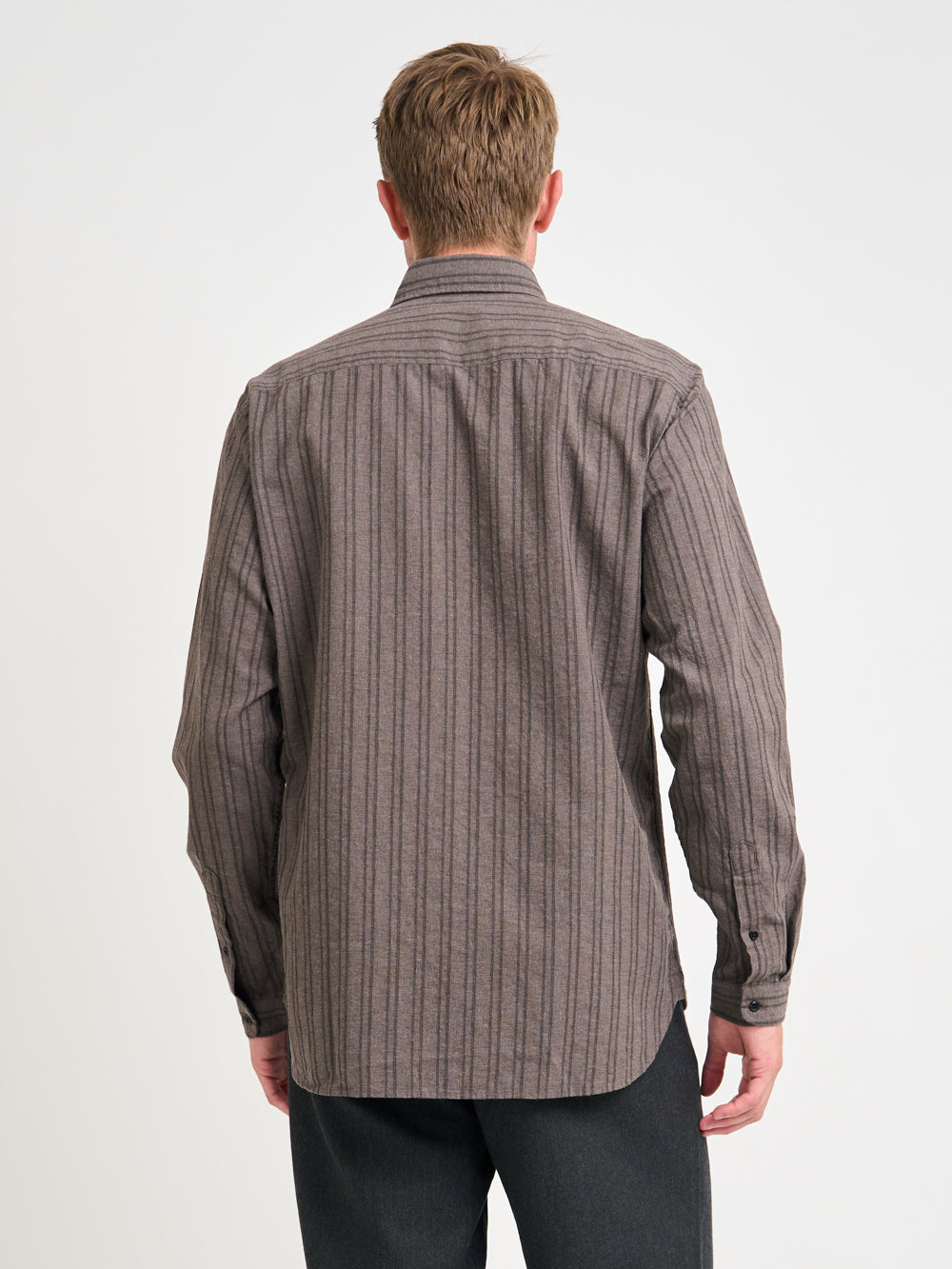 Close up back shot of model wearing Oliver Spencer Men&#39;s Button Down Striped Cotton Shirt