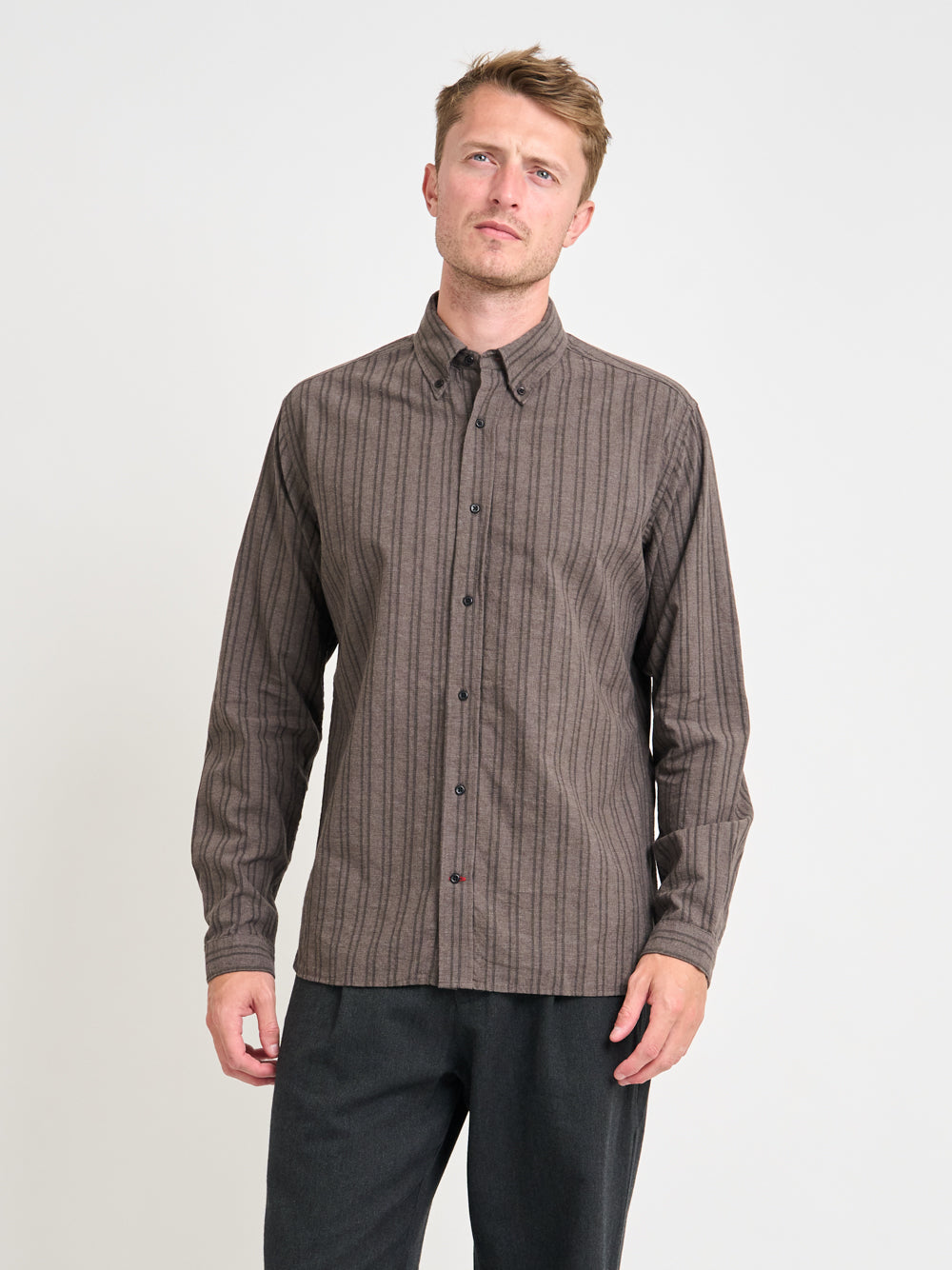 Close up shot of model wearing Oliver Spencer Men&#39;s Button Down Striped Cotton Shirt