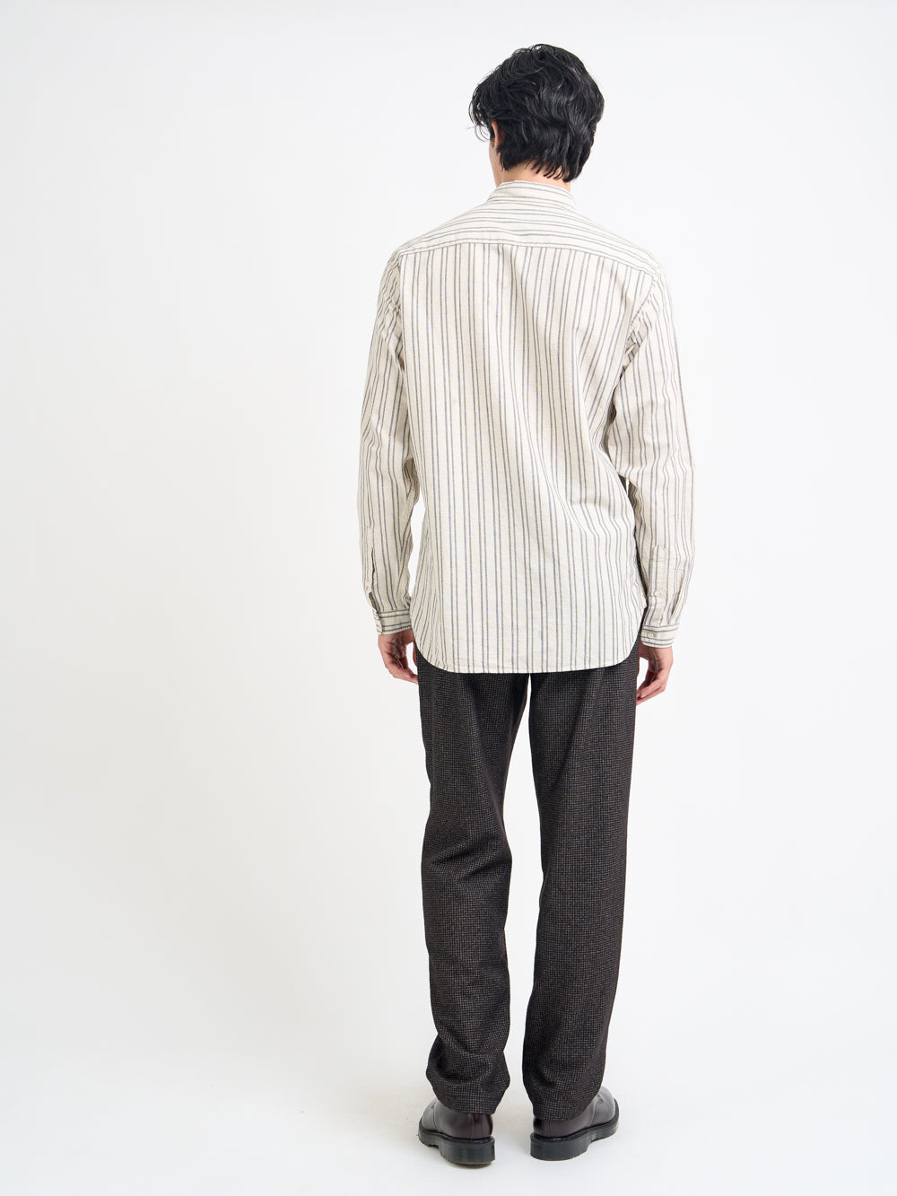 Back shot of model wearing Oliver Spencer Men's Button Down Cream Striped Cotton Shirt