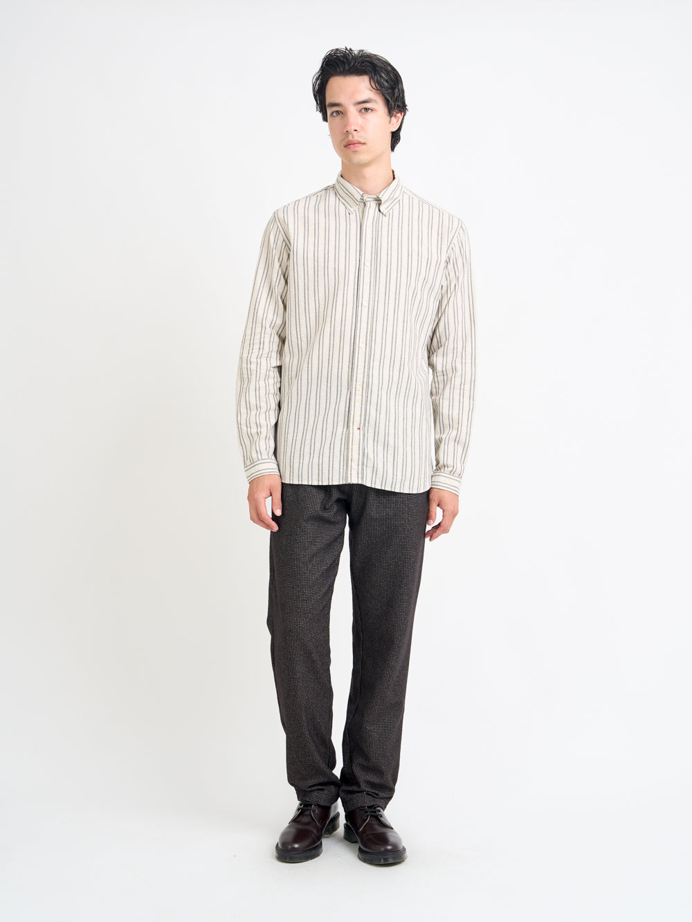 Model wearing Oliver Spencer Men's Button Down Cream Striped Cotton Shirt
