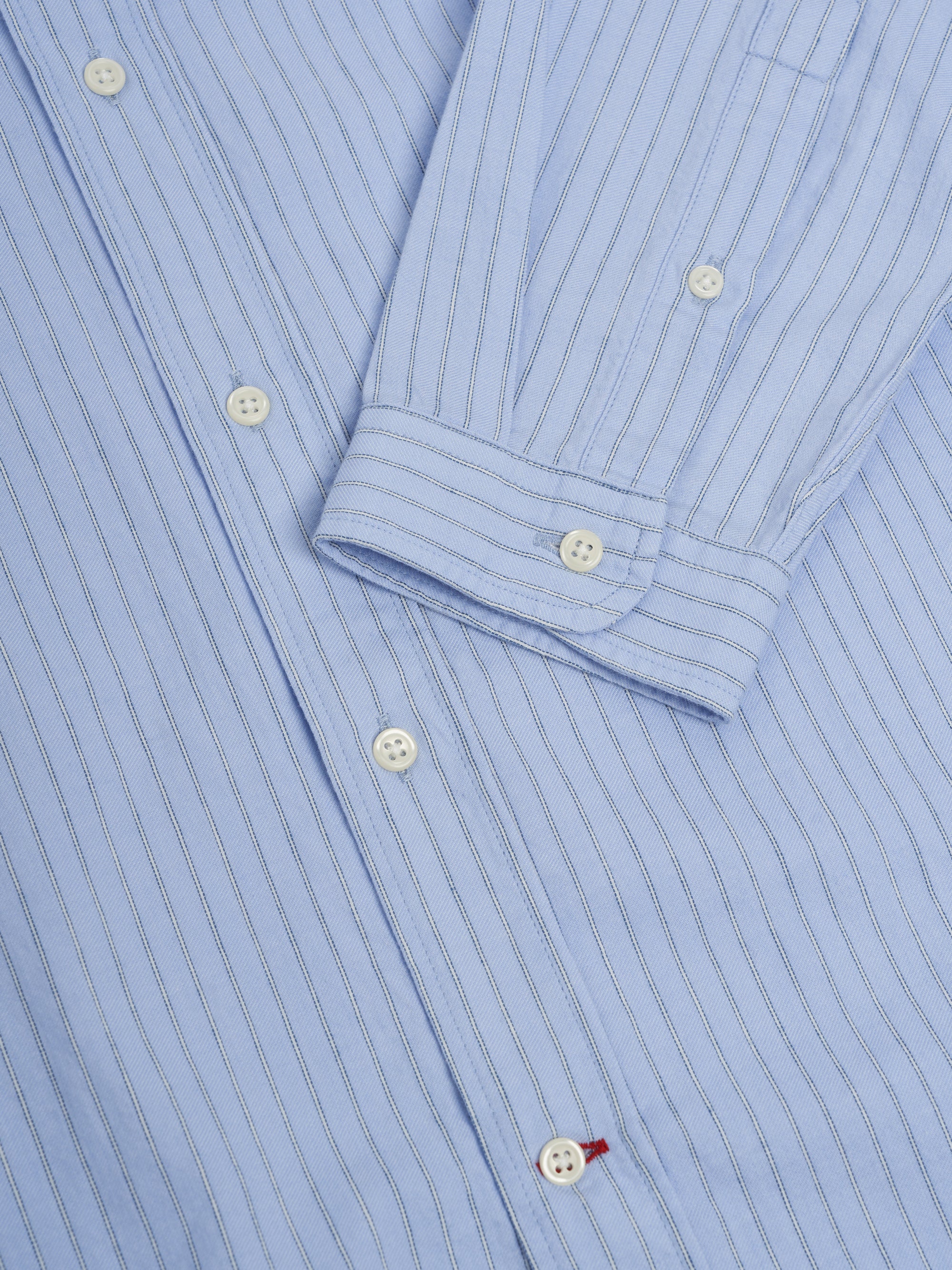 Close up cuff shot of Oliver Spencer Men's Pale Blue Pinstripe Organic Cotton Button-Down Shirt