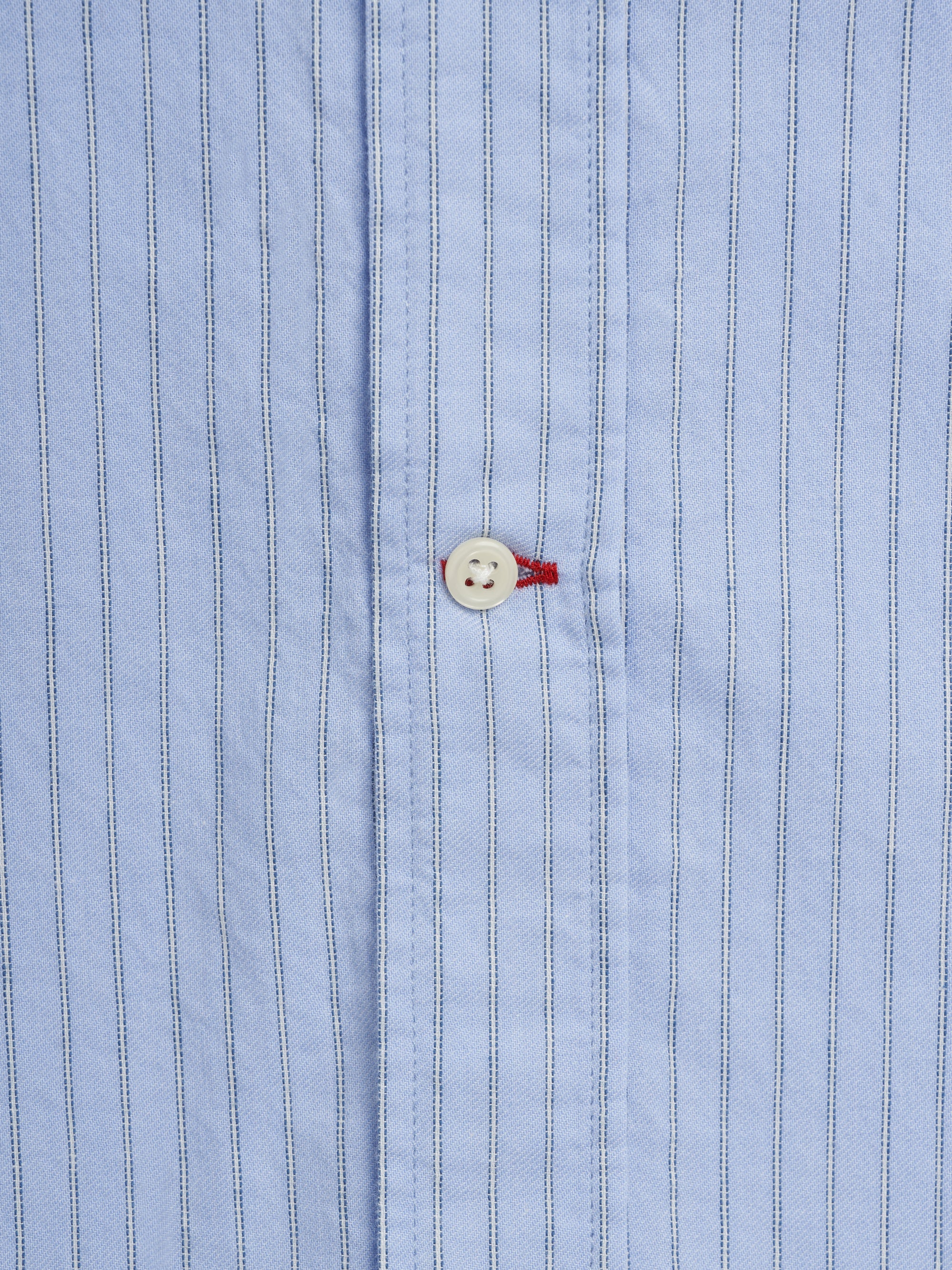 Close up button shot of Oliver Spencer Men&#39;s Pale Blue Pinstripe Organic Cotton Button-Down Shirt