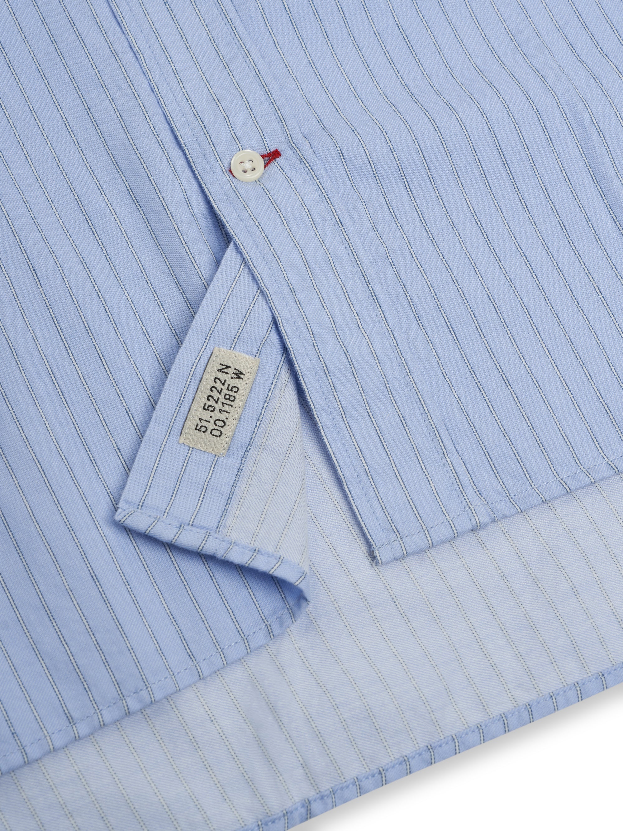 Close up shot of bottom of Oliver Spencer Men&#39;s Pale Blue Pinstripe Organic Cotton Button-Down Shirt