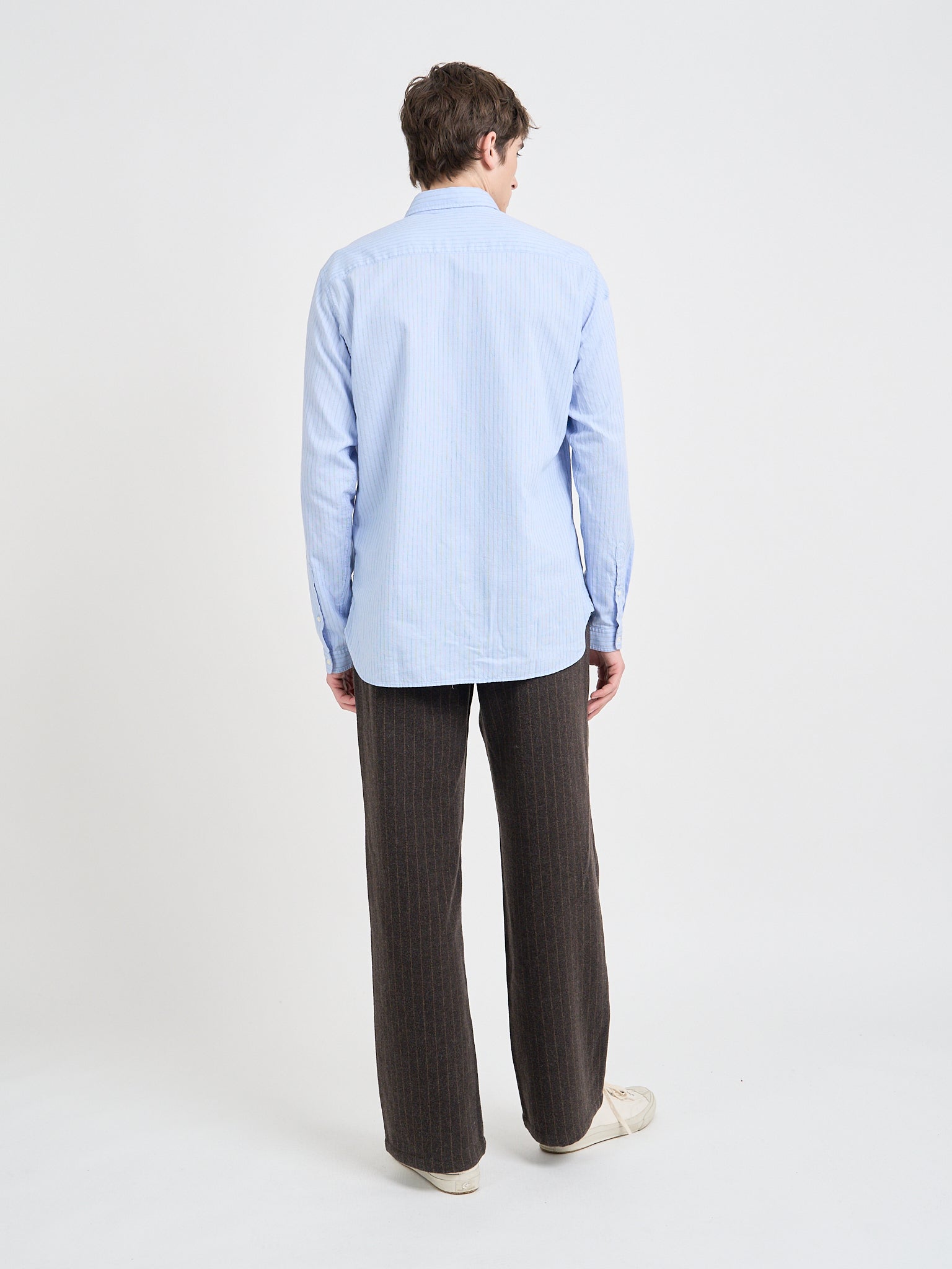 Back Shot of Model wearing Oliver Spencer Men's Pale Blue Pinstripe Organic Cotton Button-Down Shirt