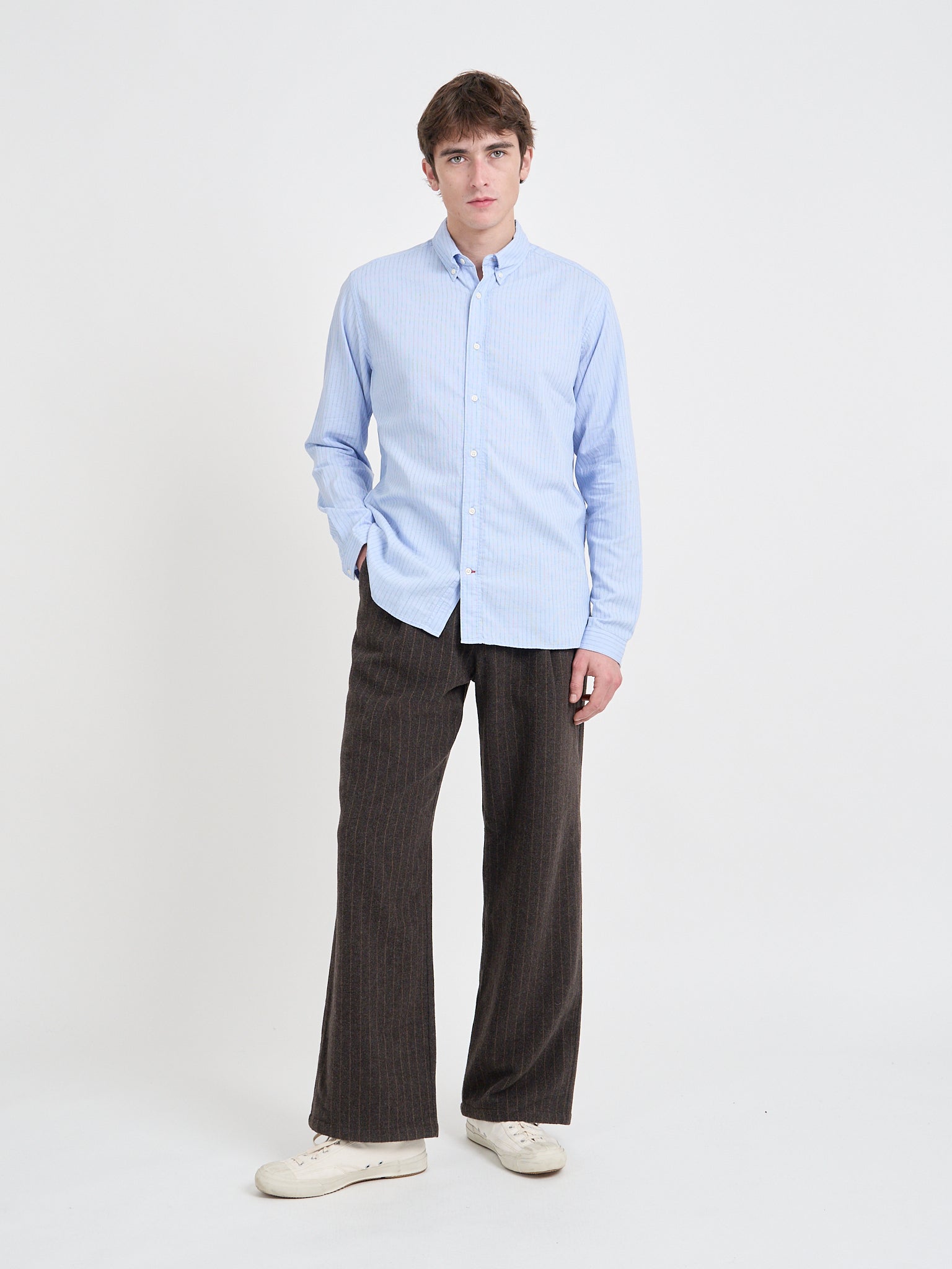 Model wearing Oliver Spencer Men's Pale Blue Pinstripe Organic Cotton Button-Down Shirt
