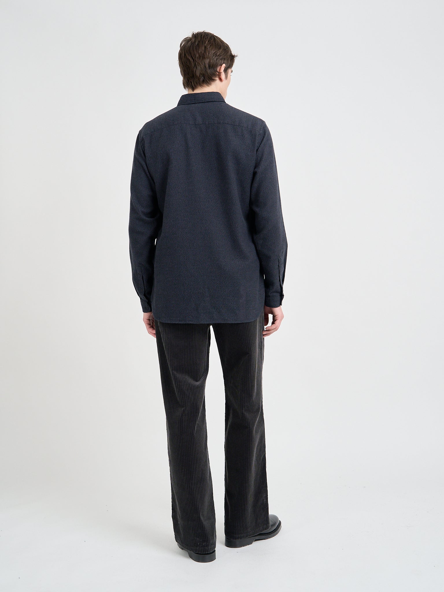 Back shot of model wearing Oliver Spencer Men's Navy Brushed Cotton Button-Down Shirt
