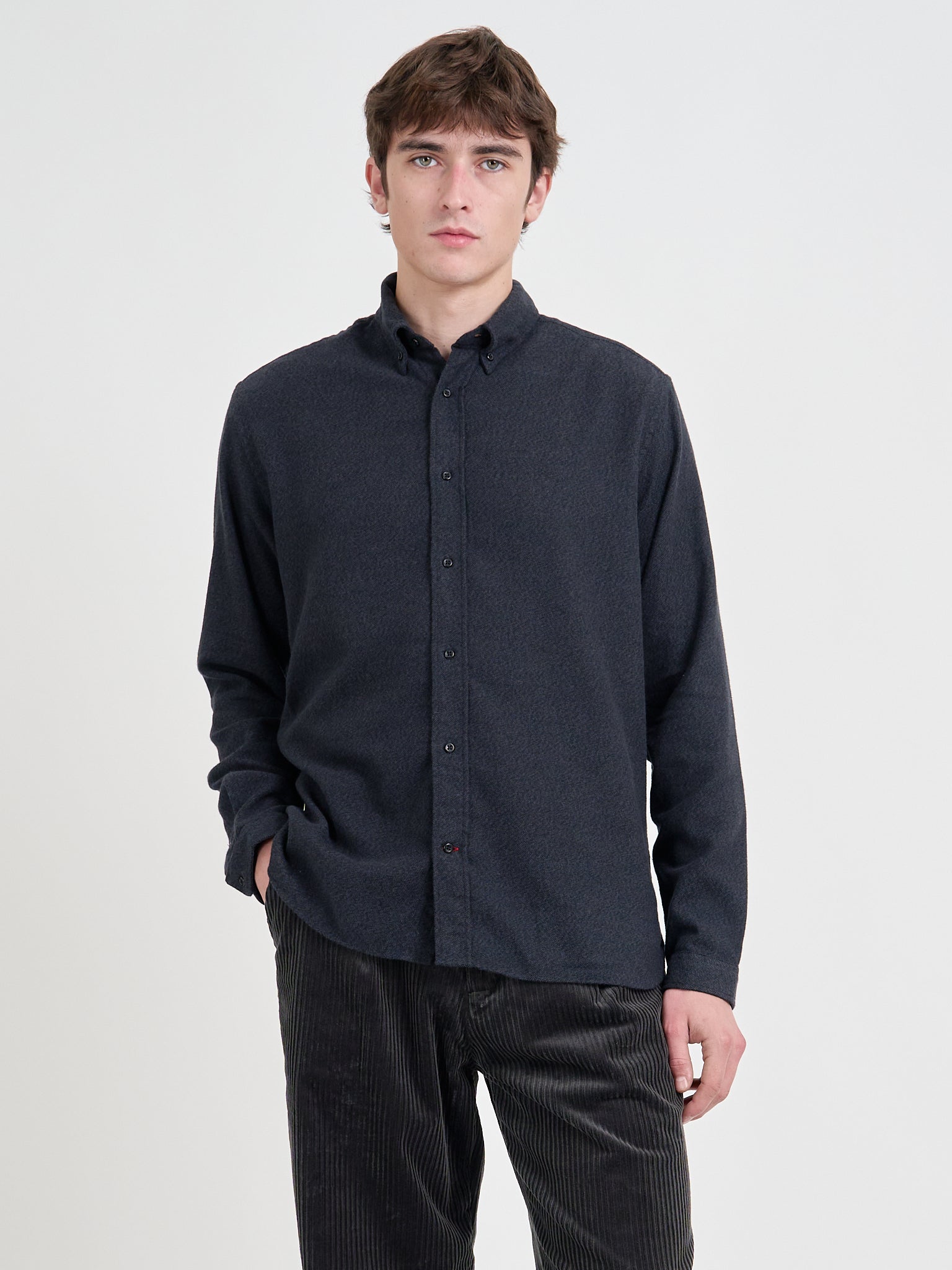 Close up shot of model wearing Oliver Spencer Men&#39;s Navy Brushed Cotton Button-Down Shirt