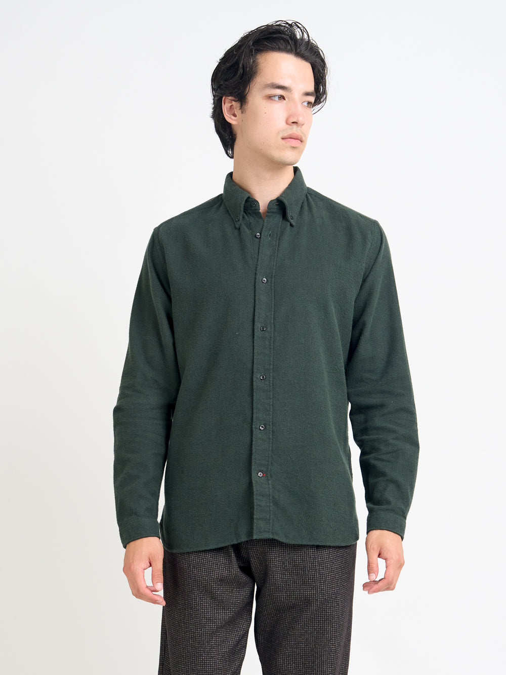 Close up shot of model wearing Oliver Spencer Men&#39;s Green Button Down Organic Cotton Shirt.