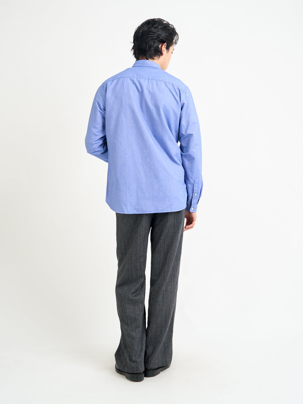 Back shot of model wearing Oliver Spencer Men's Blue Button Down Cotton Shirt