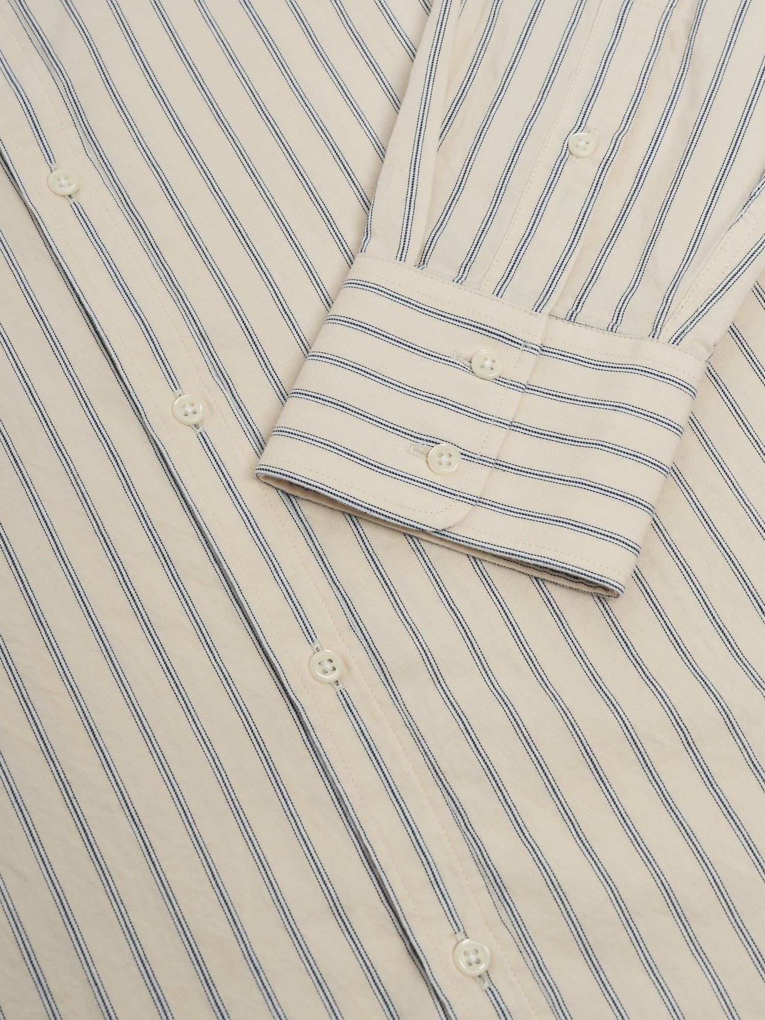 Cuff shot of Oliver Spencer Men's Cream Stripe Organic Cotton Shirt