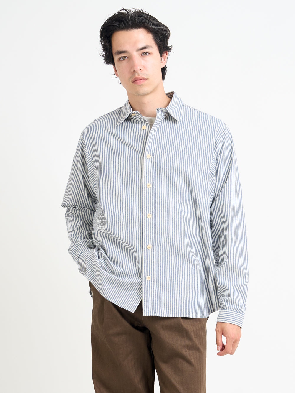 Closer shot of model wearing Oliver Spencer Oversized Spread Collar Organic Cotton Shirt