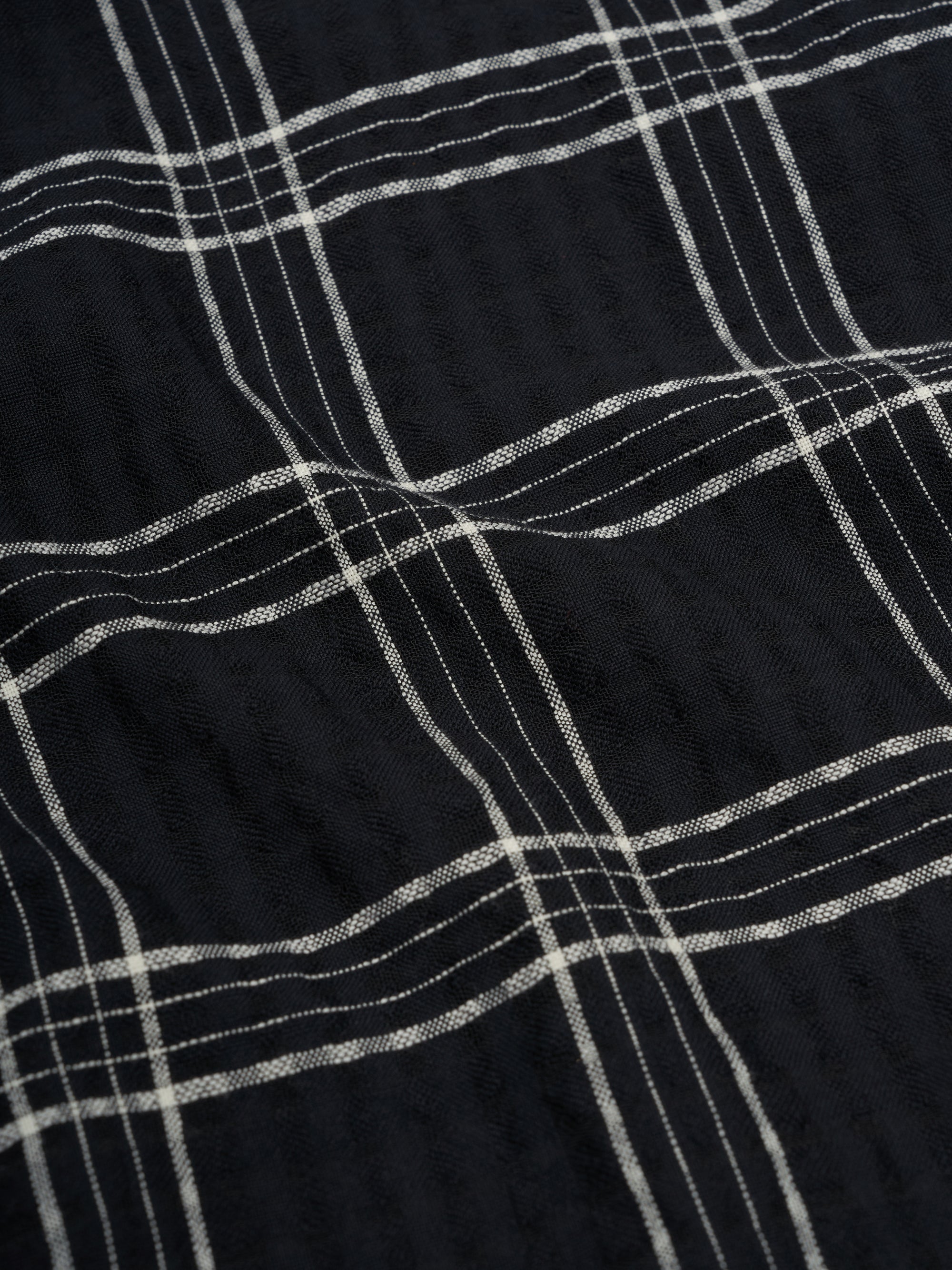 Flat shot of model wearing Oliver Spencer Loose Fitting Garrison Long Sleeve Shirt in Connell Black