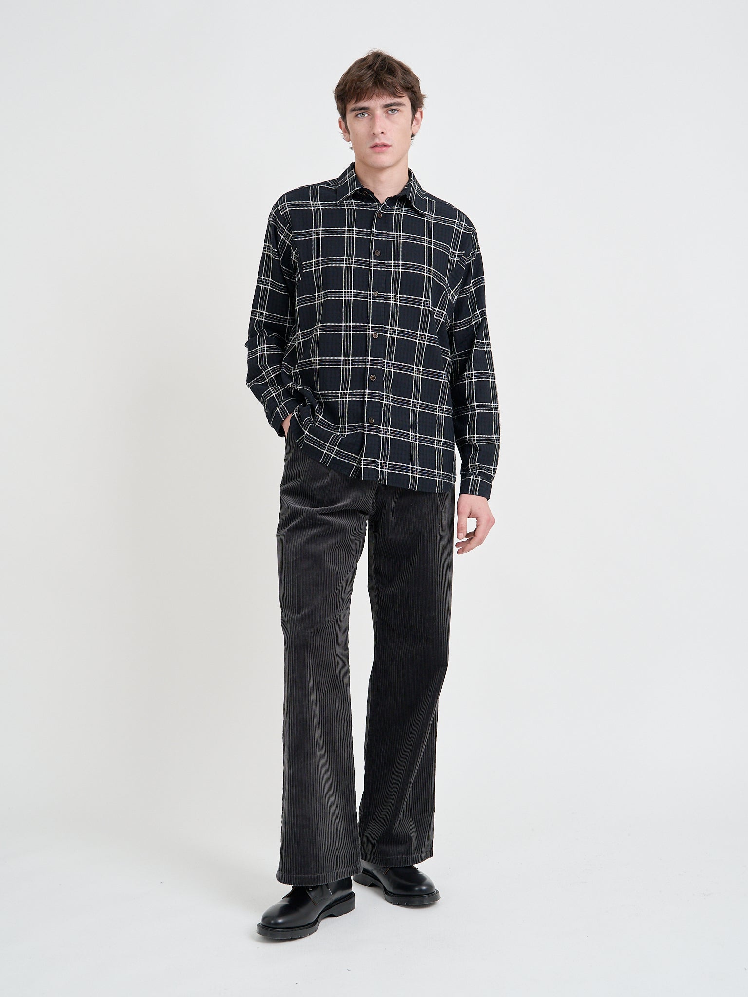 Model wearing Oliver Spencer Men's Black Organic Cotton Check Overshirt