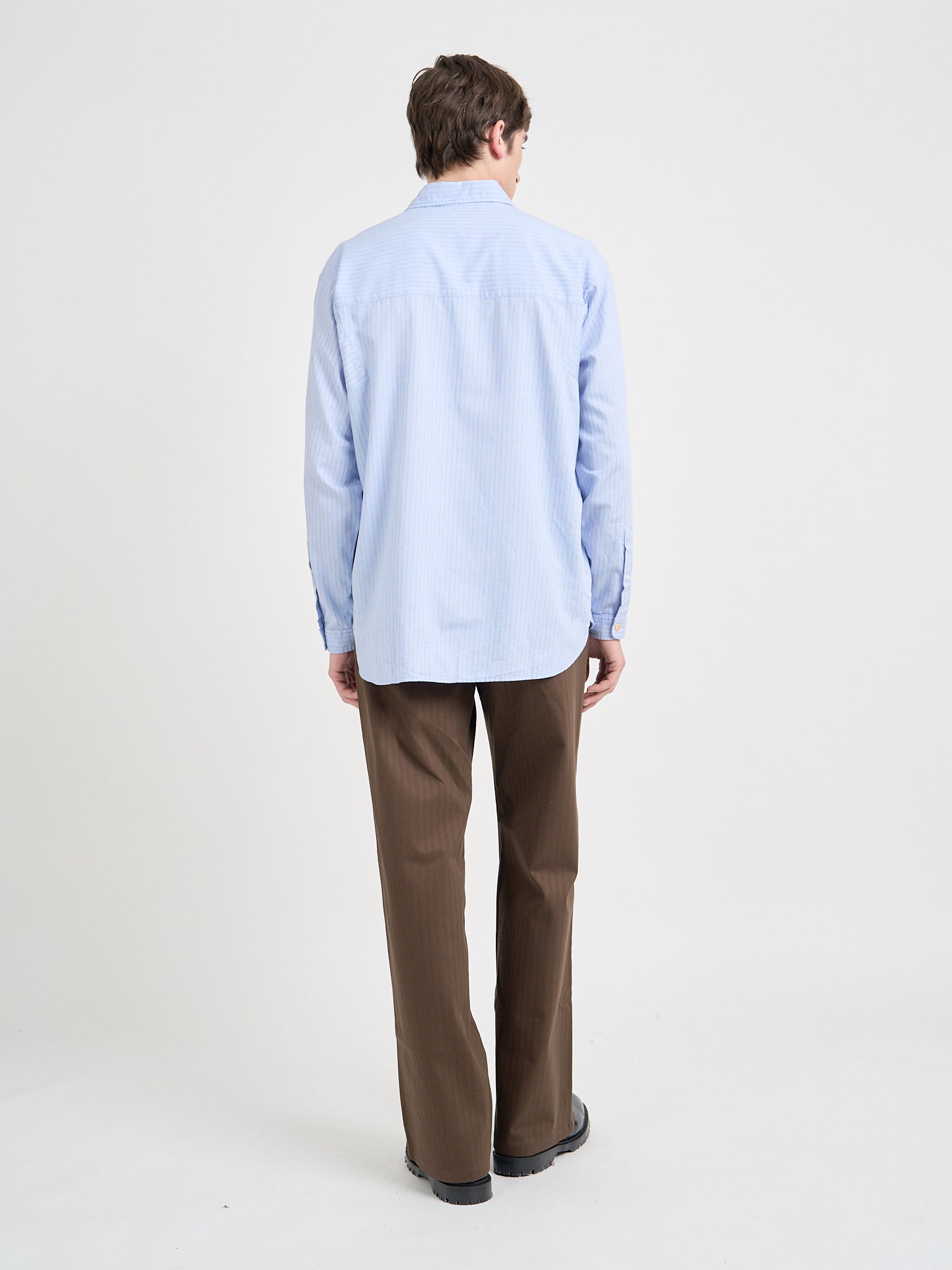 Back Shot Model wearing Oliver Spencer Men's Light Blue Organic Cotton Overshirt