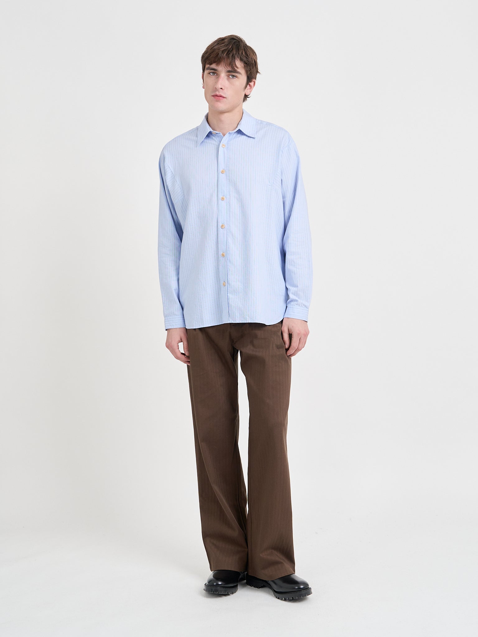 Model wearing Oliver Spencer Men's Light Blue Organic Cotton Overshirt