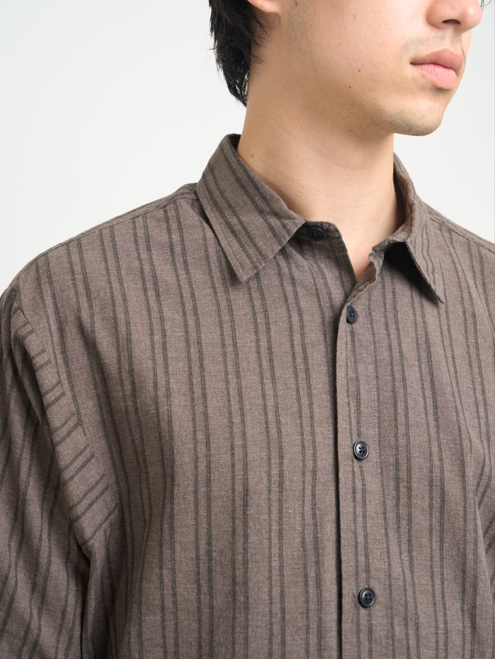 Close up collar shot of model wearing Oliver Spencer Men&#39;s Brown Striped Oversized Spread Collar Cotton Shirt
