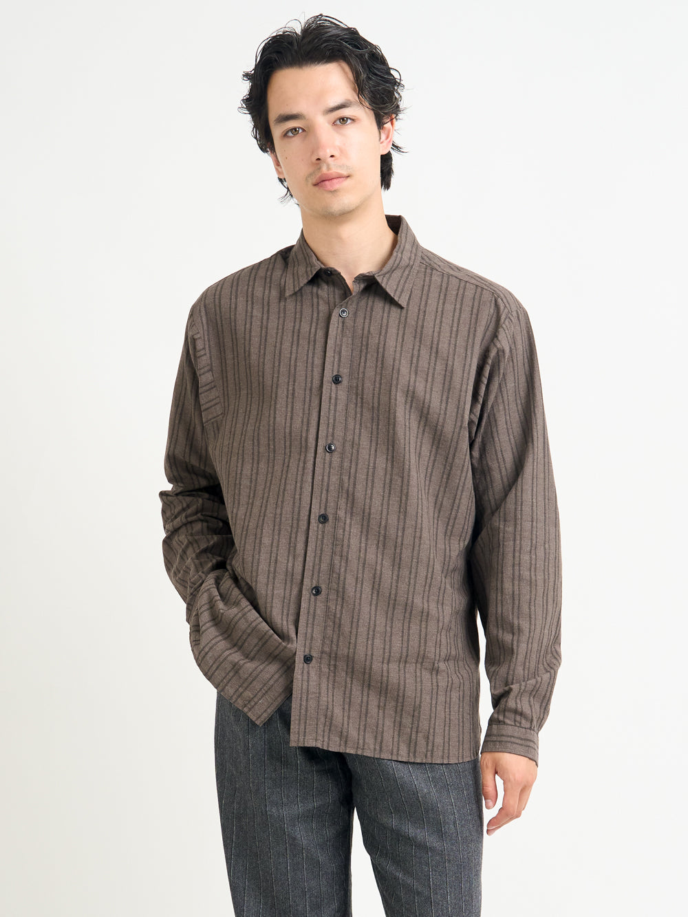 Close up shot of model wearing Oliver Spencer Men&#39;s Brown Striped Oversized Spread Collar Cotton Shirt