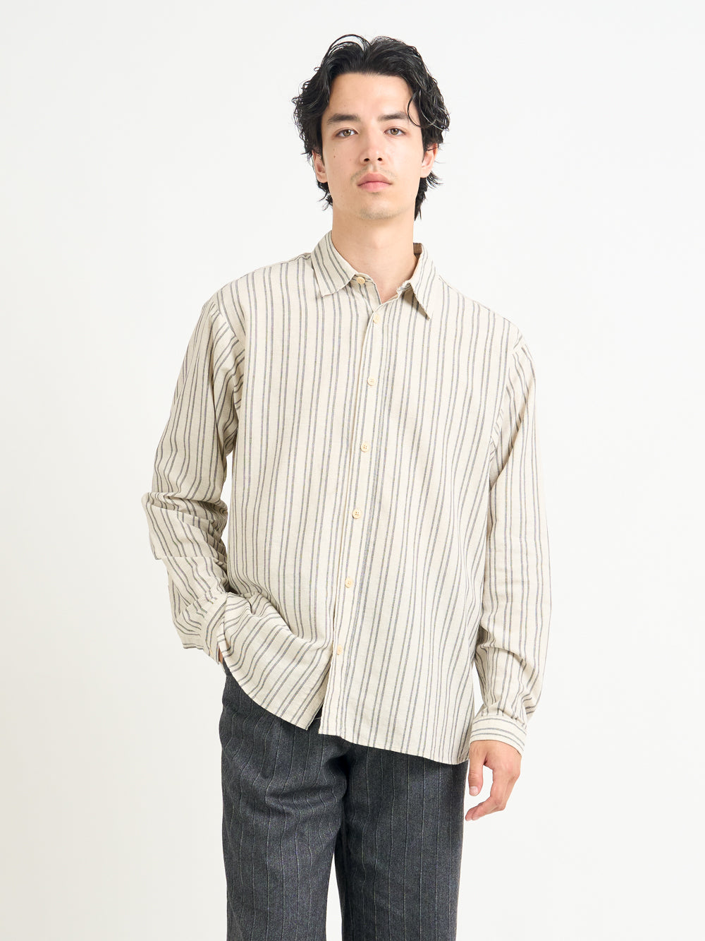 Detailed collar shot of model wearing Oliver Spencer Men&#39;s Oversized Striped Cream Spread Collar Cotton Shirt