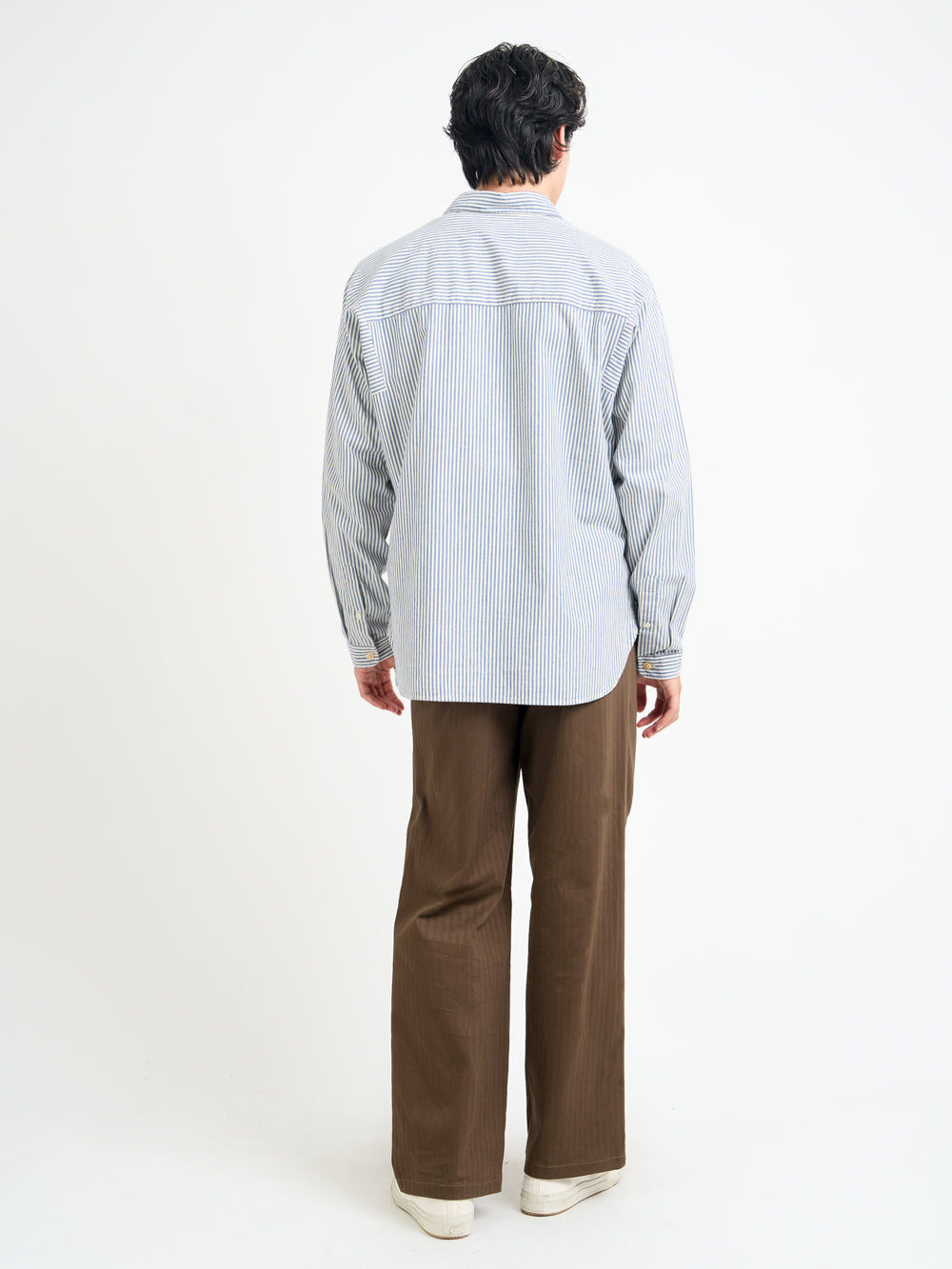 Back Shot of Model wearing Men's Oliver Spencer Blue and White striped Oversized Spread Collar Organic Cotton Shirt