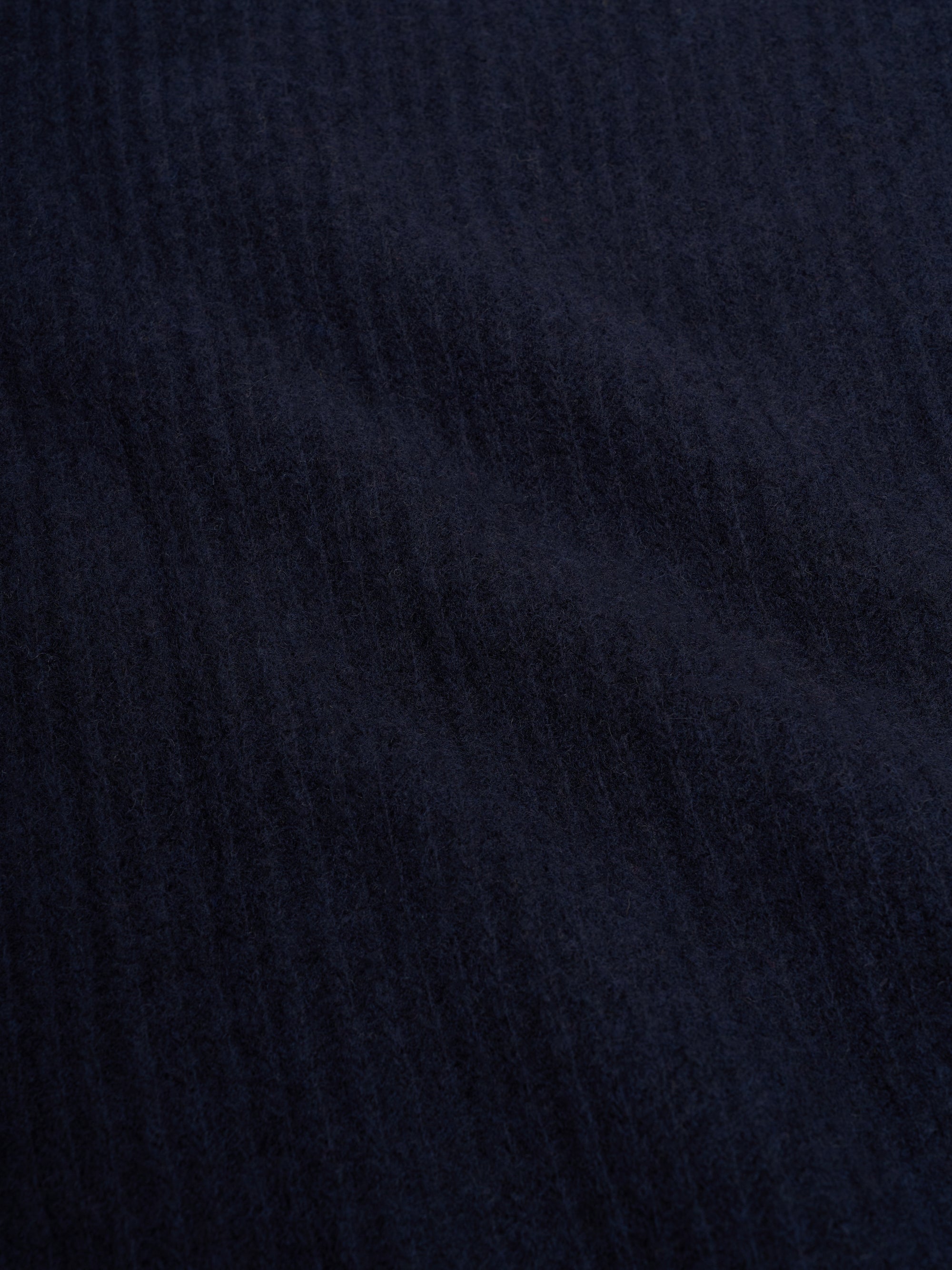 Detailed material shot of Oliver Spencer Men's Navy Zip up Wool Cardigan