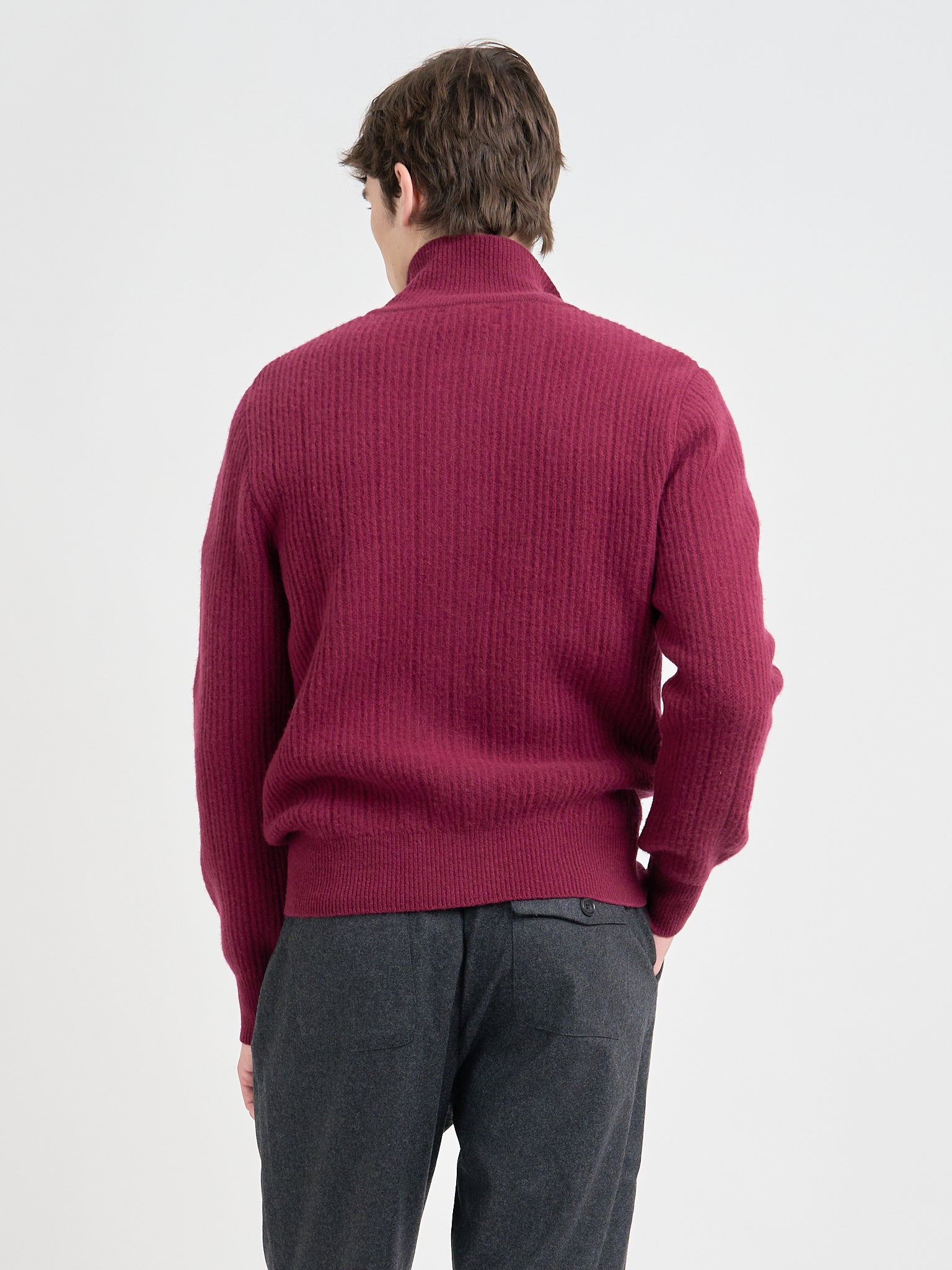 Detailed back shot of model wearing Oliver Spencer Men's Burgundy Zip up Cardigan