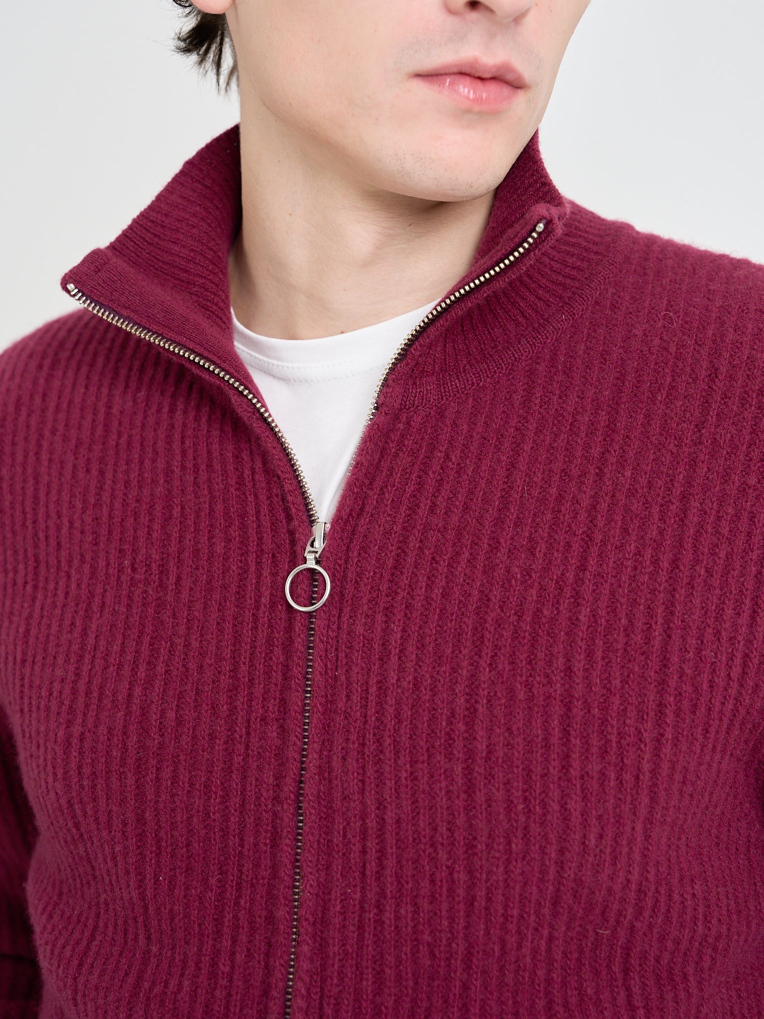Detailed collar shot of model wearing Oliver Spencer Men's Burgundy Zip up Cardigan
