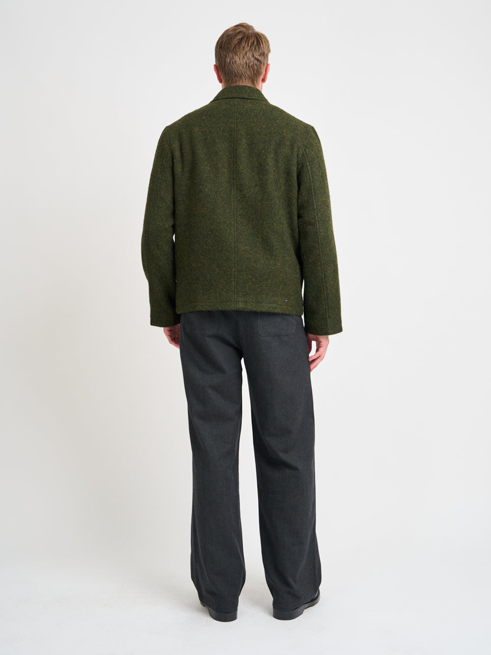 Back shot of model wearing Oliver Spencer Men's Green Midweight Wool Field Jacket