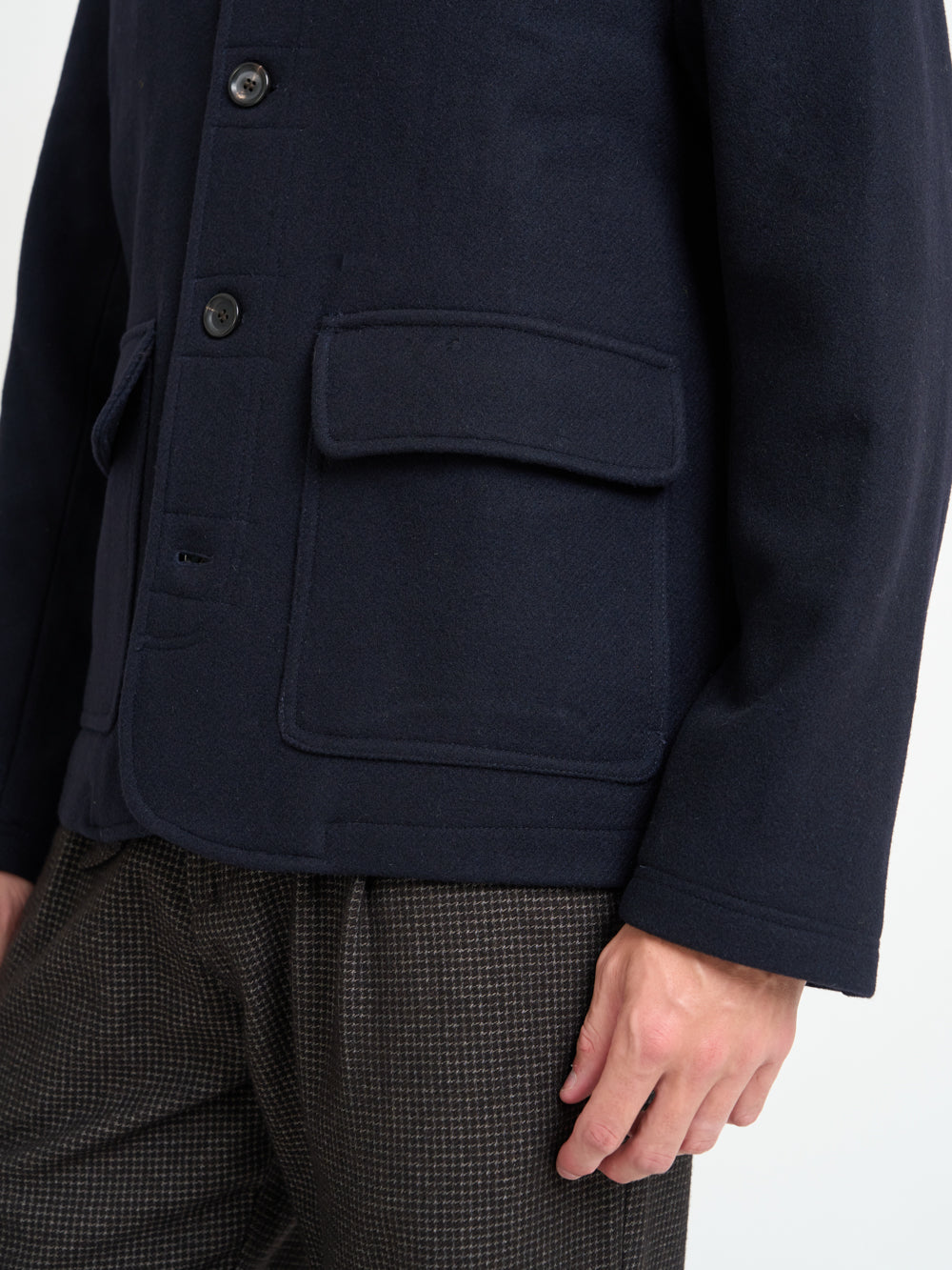 Detailed pocket shot of model wearing Oliver Spencer Black Lambeth Jacket