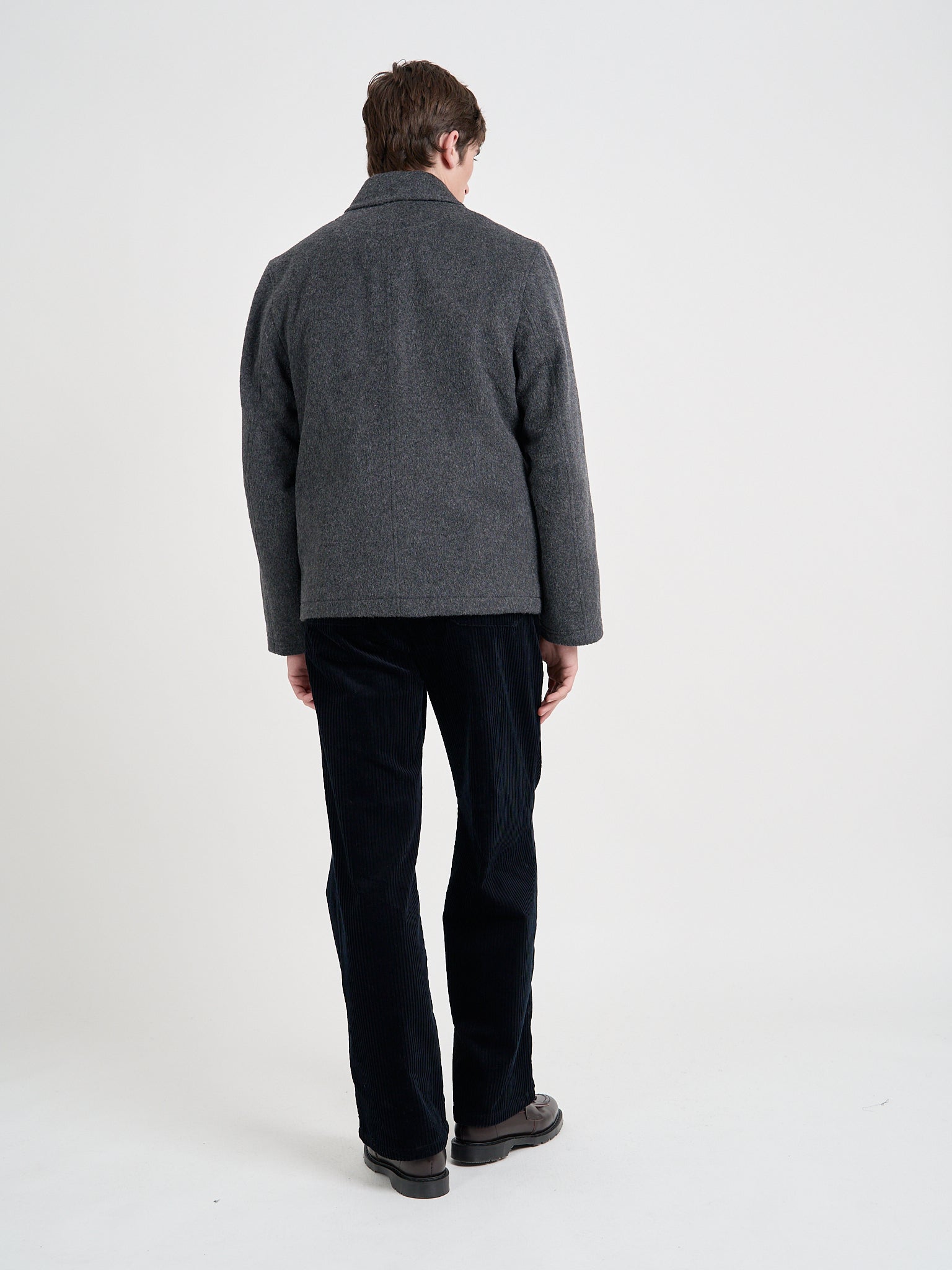 Back shot of model wearing Oliver Spencer Men's Charcoal Recycled Wool And Mohair Chore Jacket
