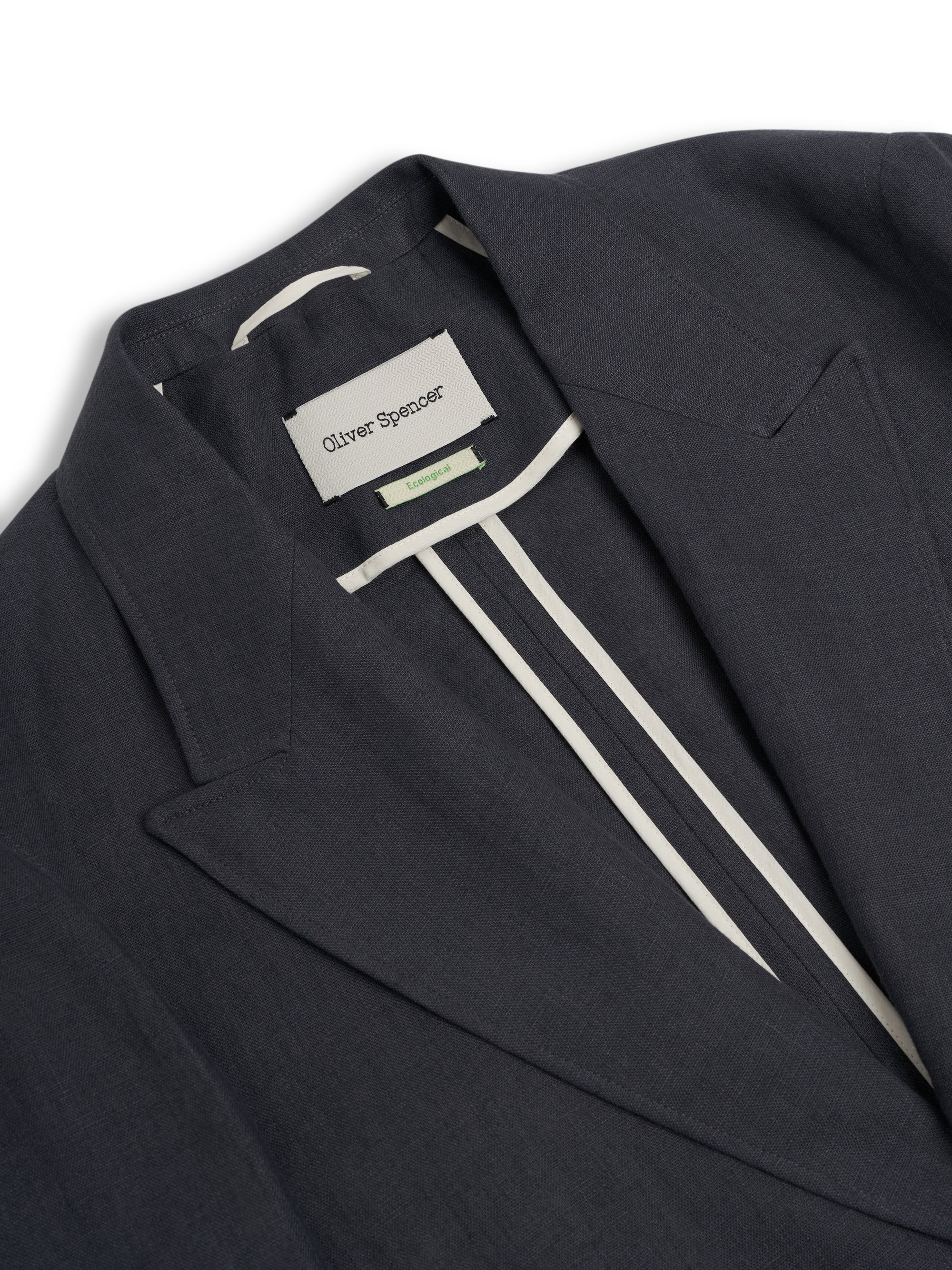 Detailed collar shot of Oliver Spencer Men's Single Breasted Peak Lapel Linen Jacket