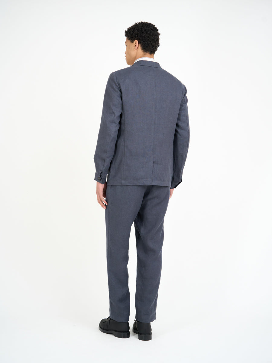 Back shot of model wearing Oliver Spencer Men's Single Breasted Peak Lapel Linen Jacket
