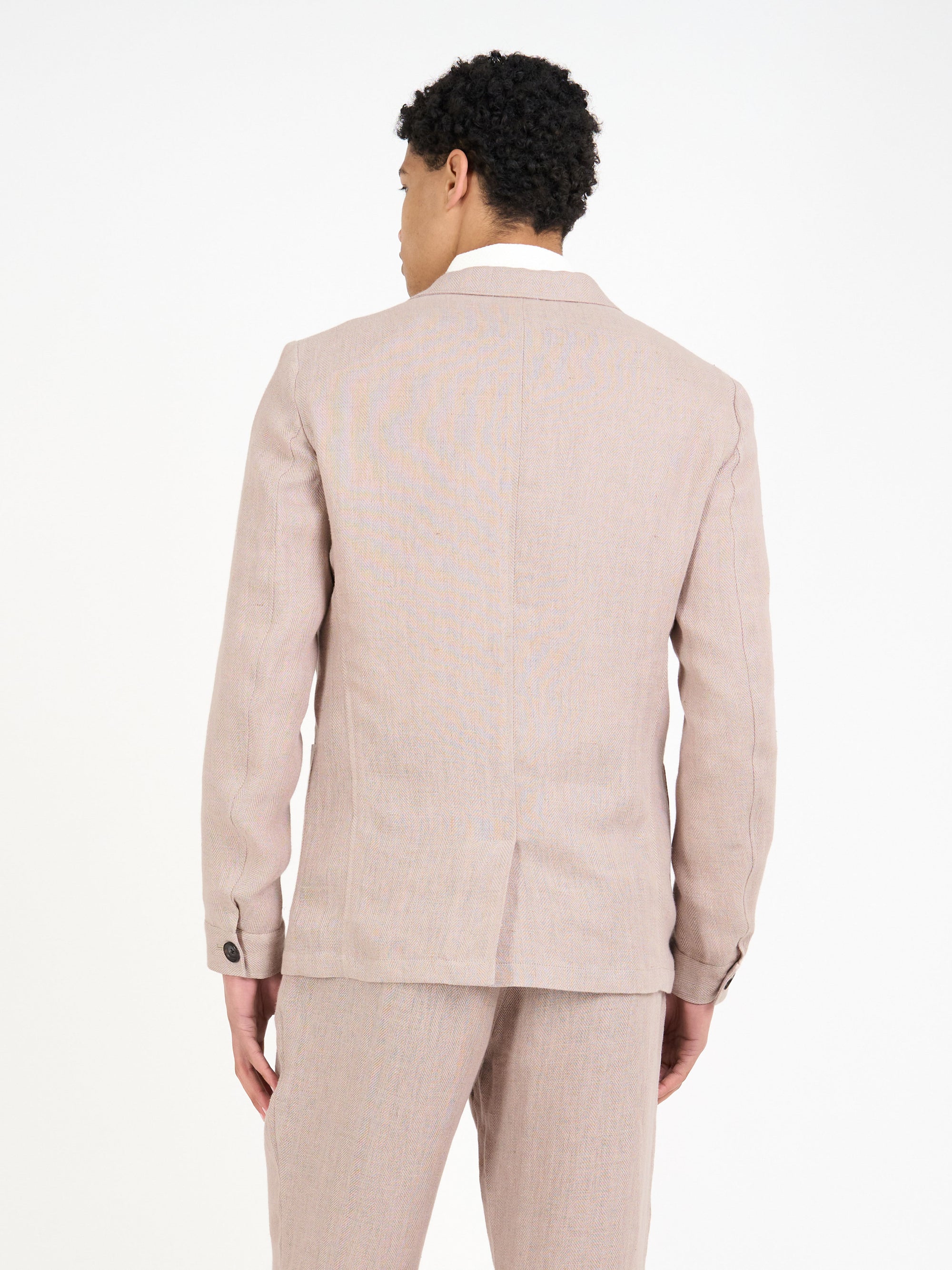Close up back shot of model wearing Oliver Spencer Men's Single Breasted Peak Lapel Pink Linen Jacket