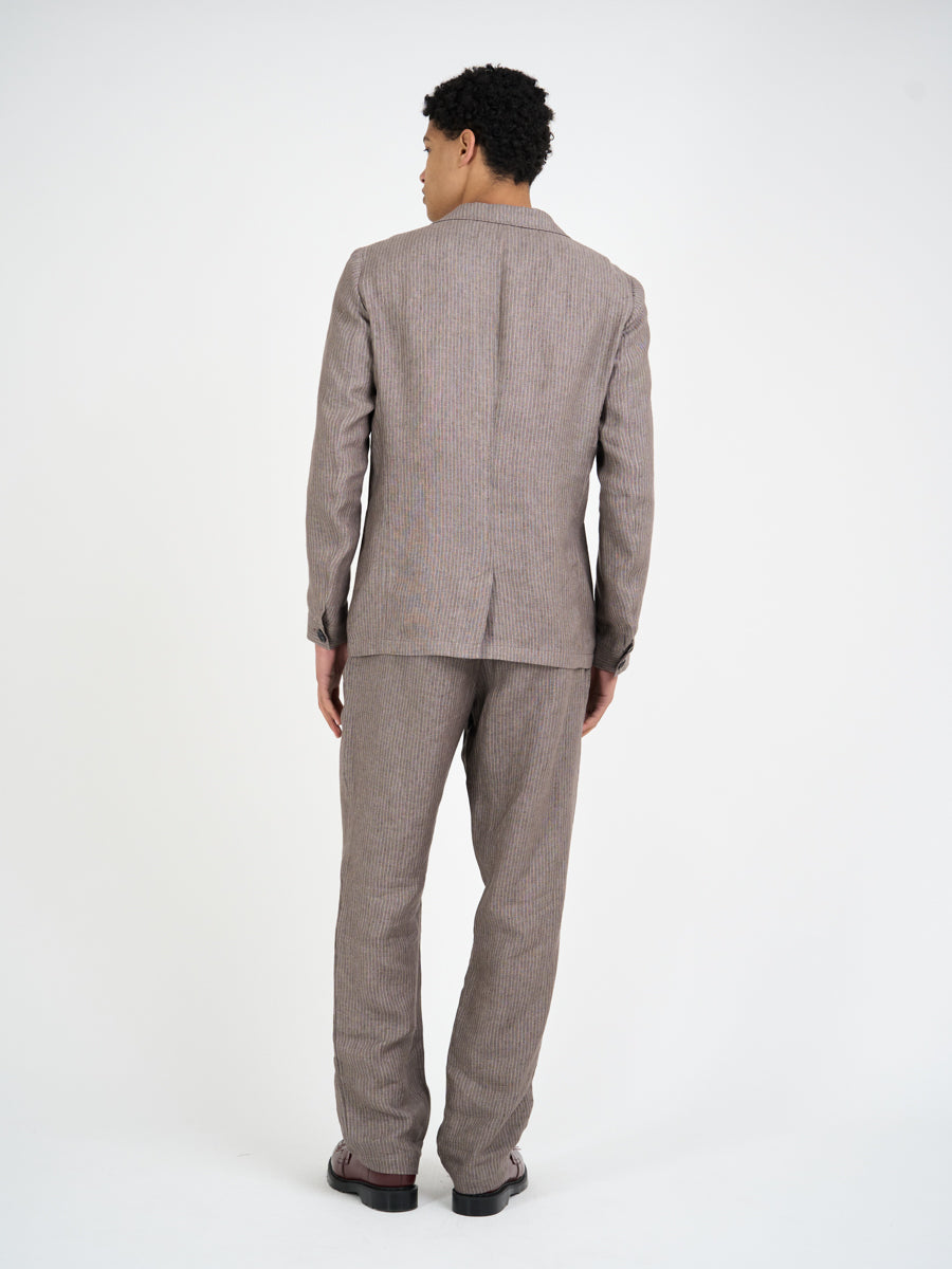 Close up back shot of model wearing Oliver Spencer Men's Single Breasted Peak Lapel Linen Jacket