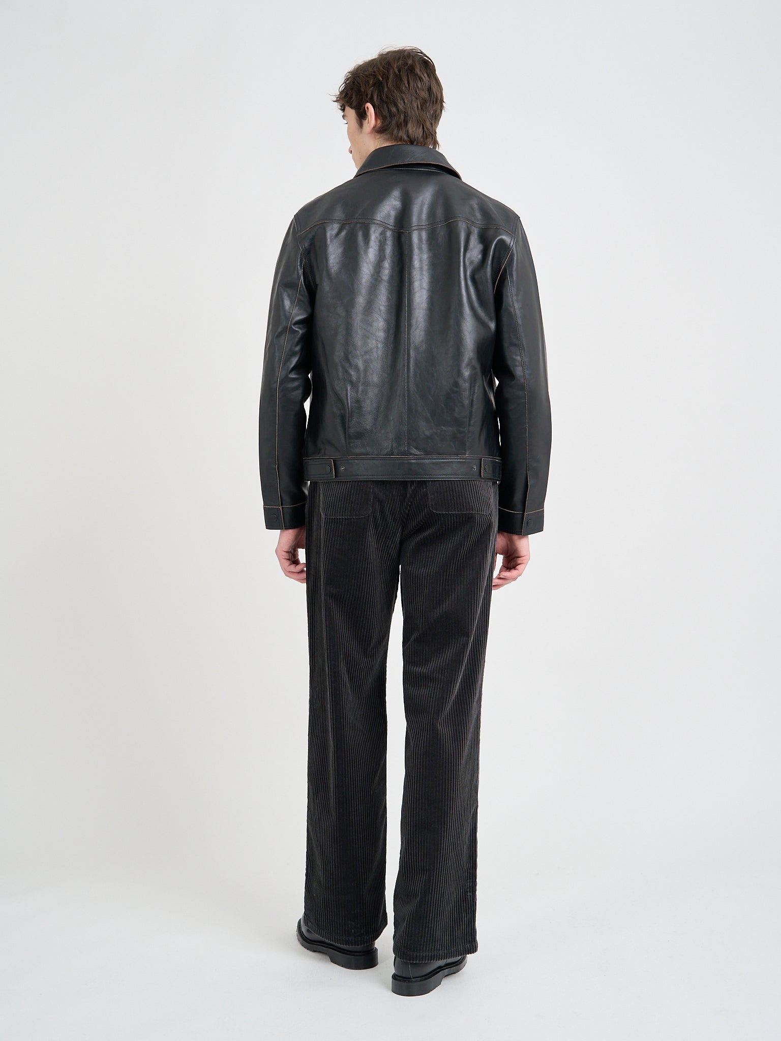 Back shot of model wearing Oliver Spencer Men's Black Leather Jacket