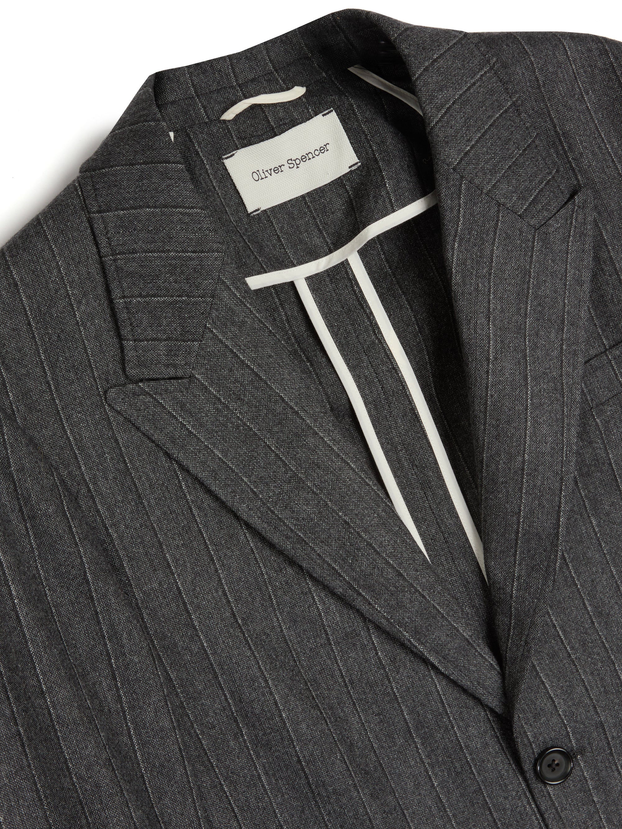 Close up collar shot of Oliver Spencer Men's Unstructured Peak Lapel Grey Striped Jacket