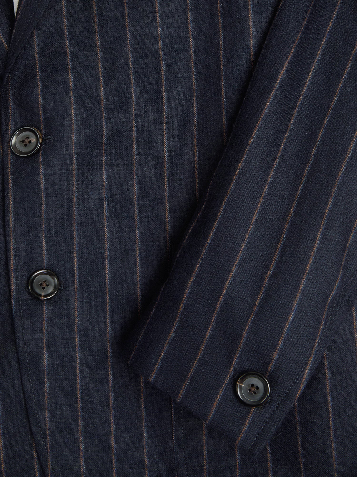Close up cuff shot of Oliver Spencer Men's Unstructured Peak Lapel Navy Striped Jacket