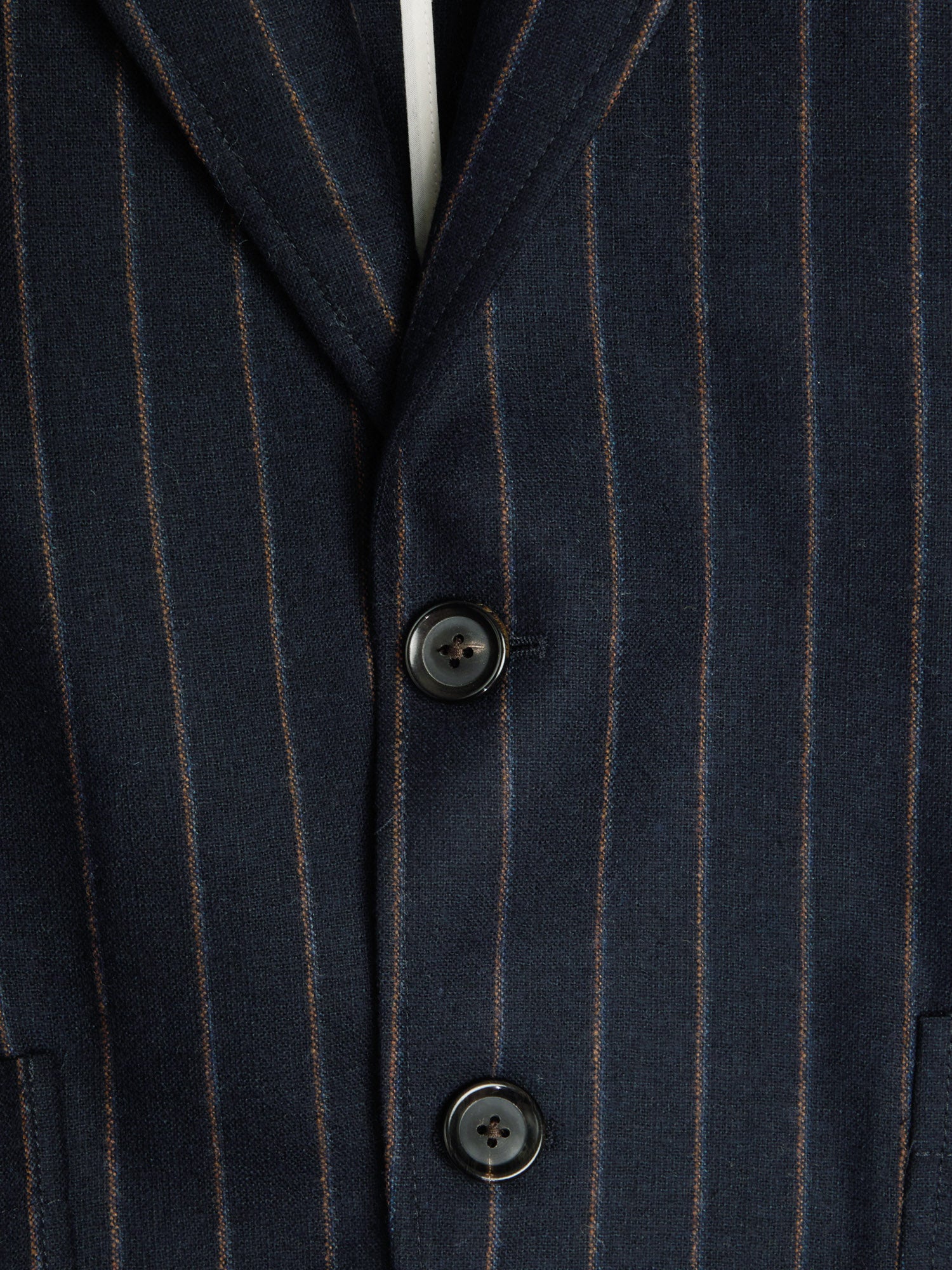 Close up button shot of Oliver Spencer Men's Unstructured Peak Lapel Navy Striped Jacket