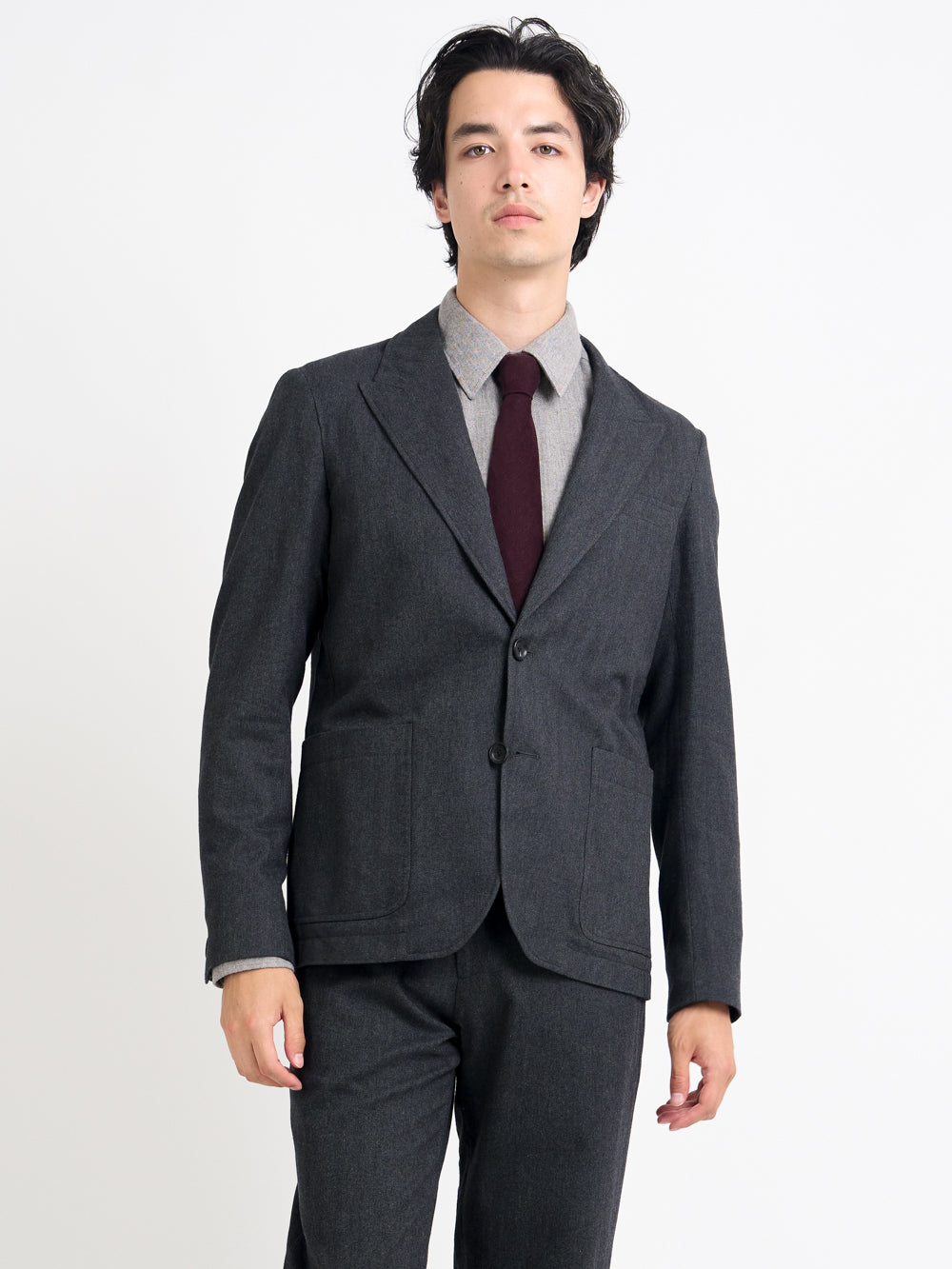 Close up collar shot of model wearing Oliver Spencer Men's Unstructured Peak Lapel Grey Jacket