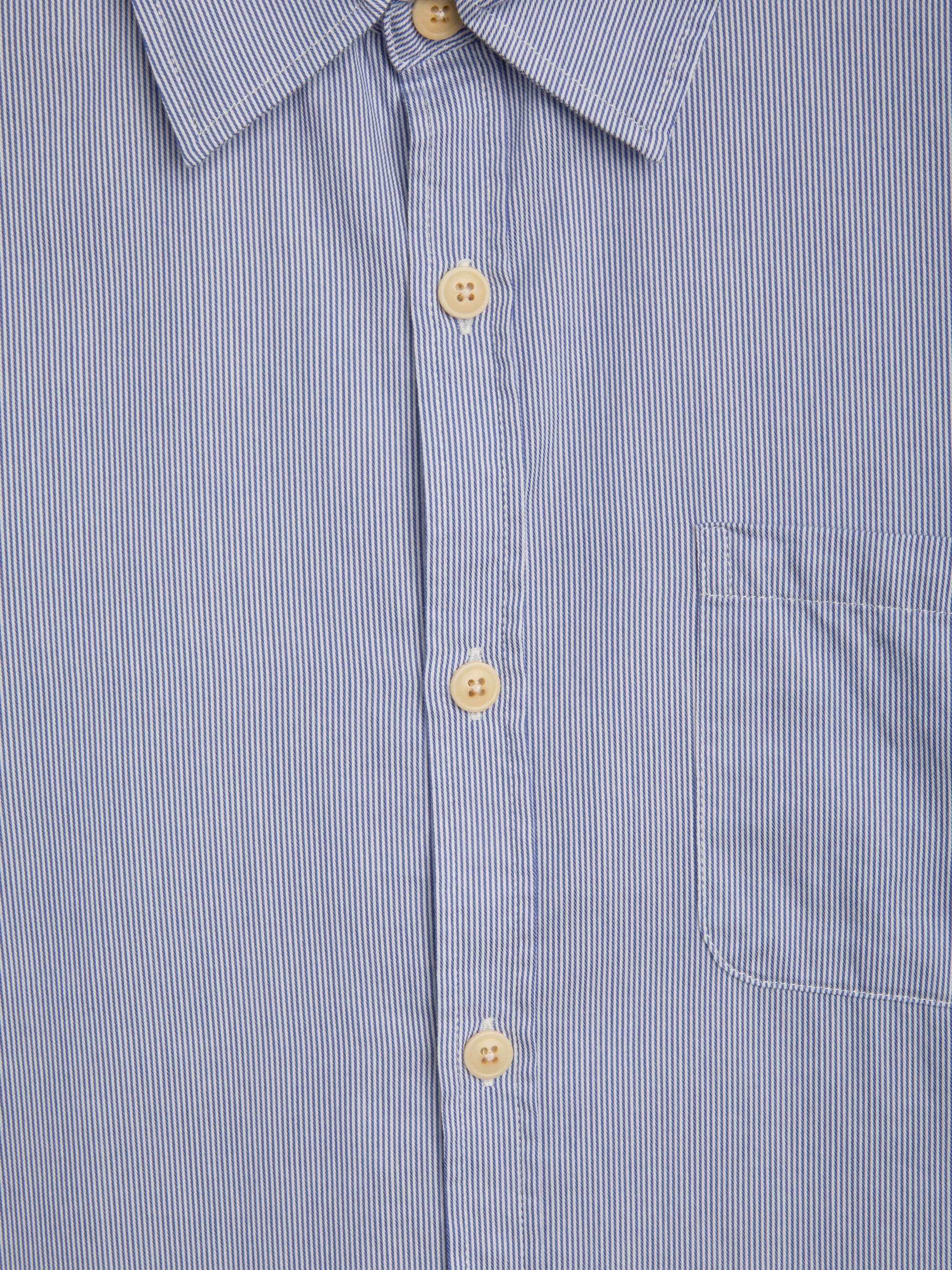 Close up button shot of Oliver Spencer Striped Light Blue and White Spear Collar Organic Cotton Shirt