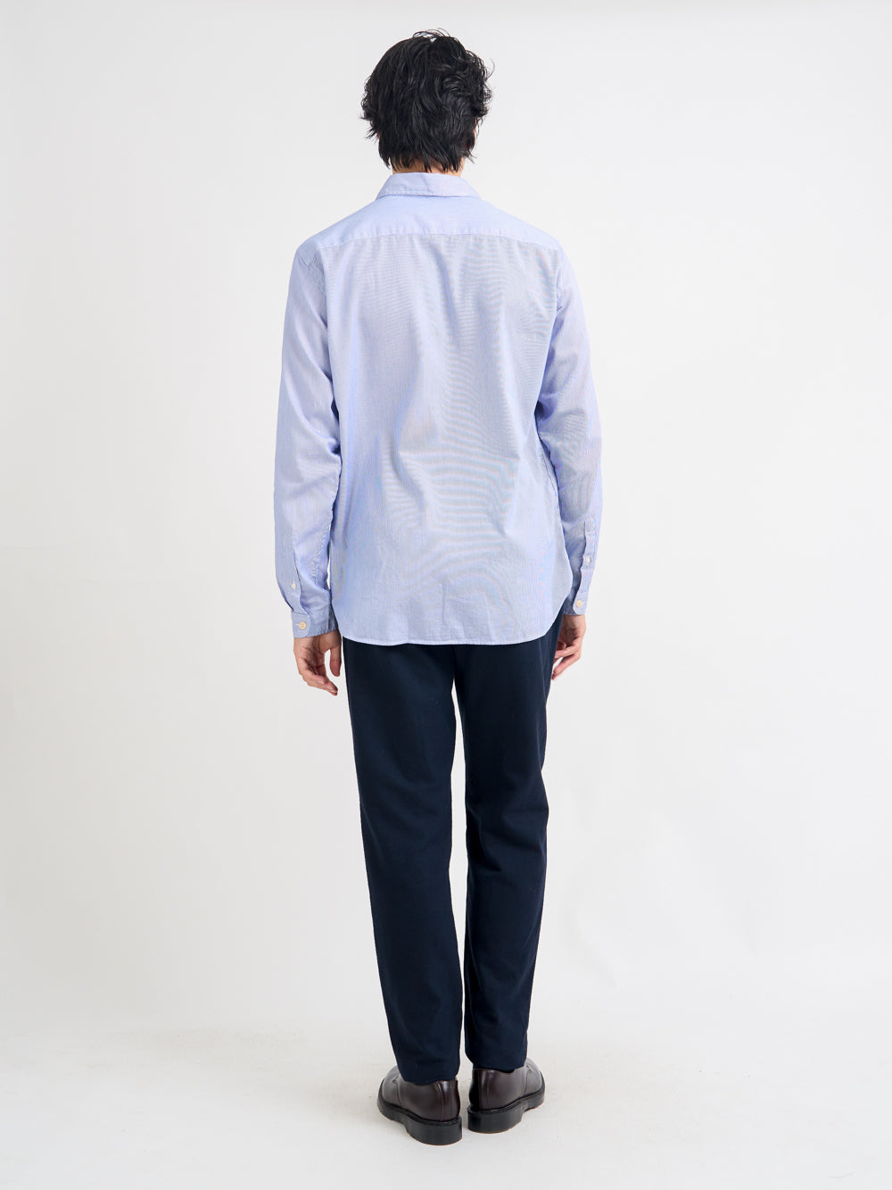 Back shot of model wearing Oliver Spencer Striped Light Blue and White Spear Collar Organic Cotton Shirt