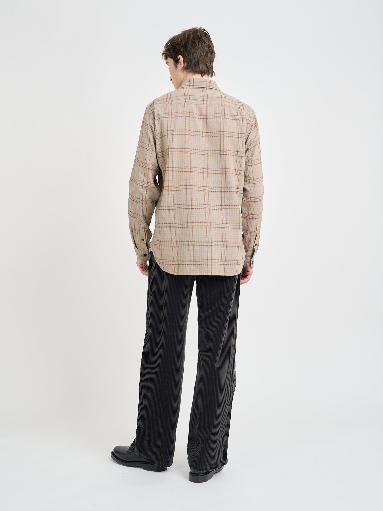 Back shot of model wearing an Oliver Spencer New York Special Shirt in Connell Beige