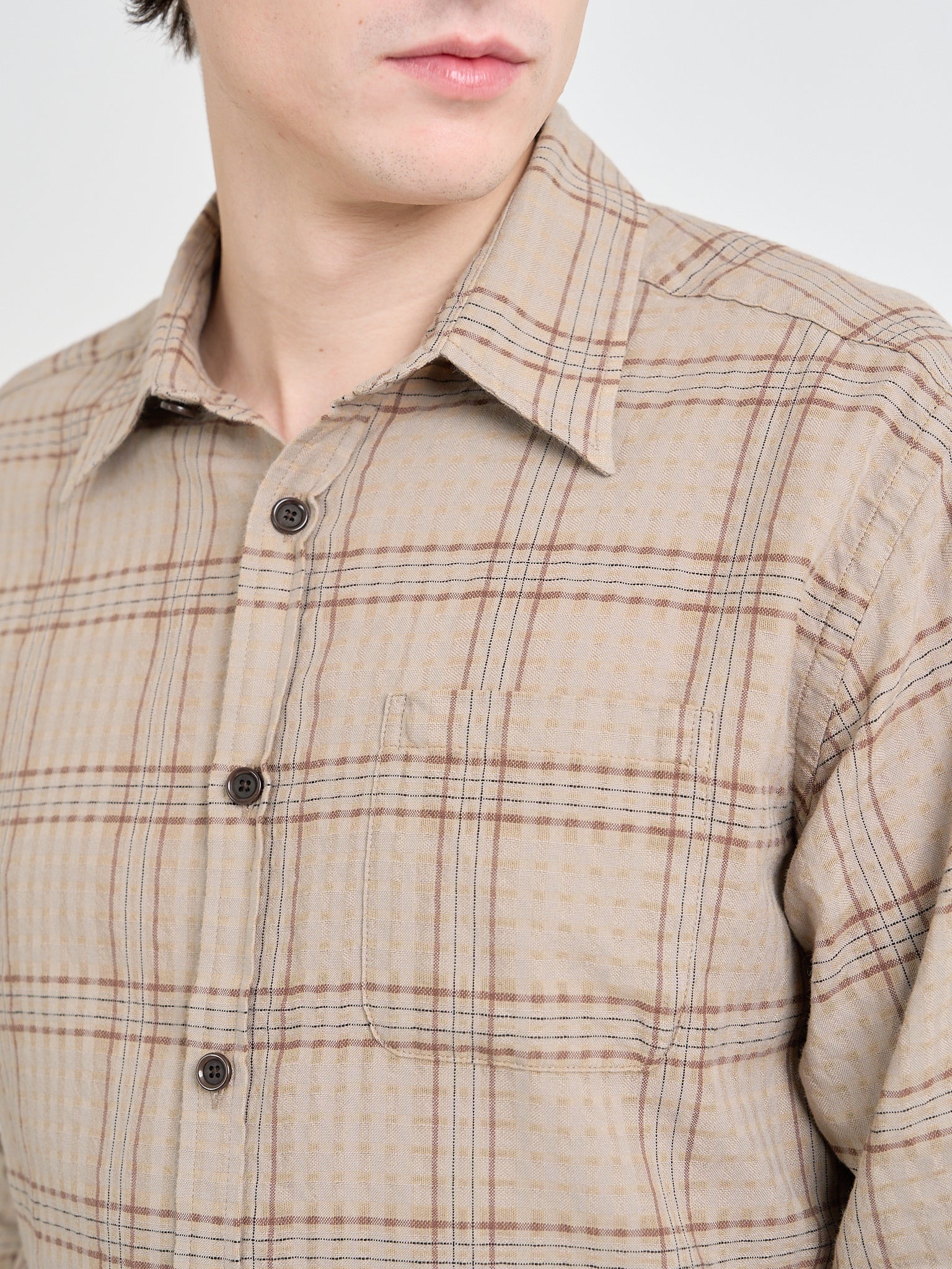 Close up collar shot of model wearing an Oliver Spencer New York Special Shirt in Connell Beige