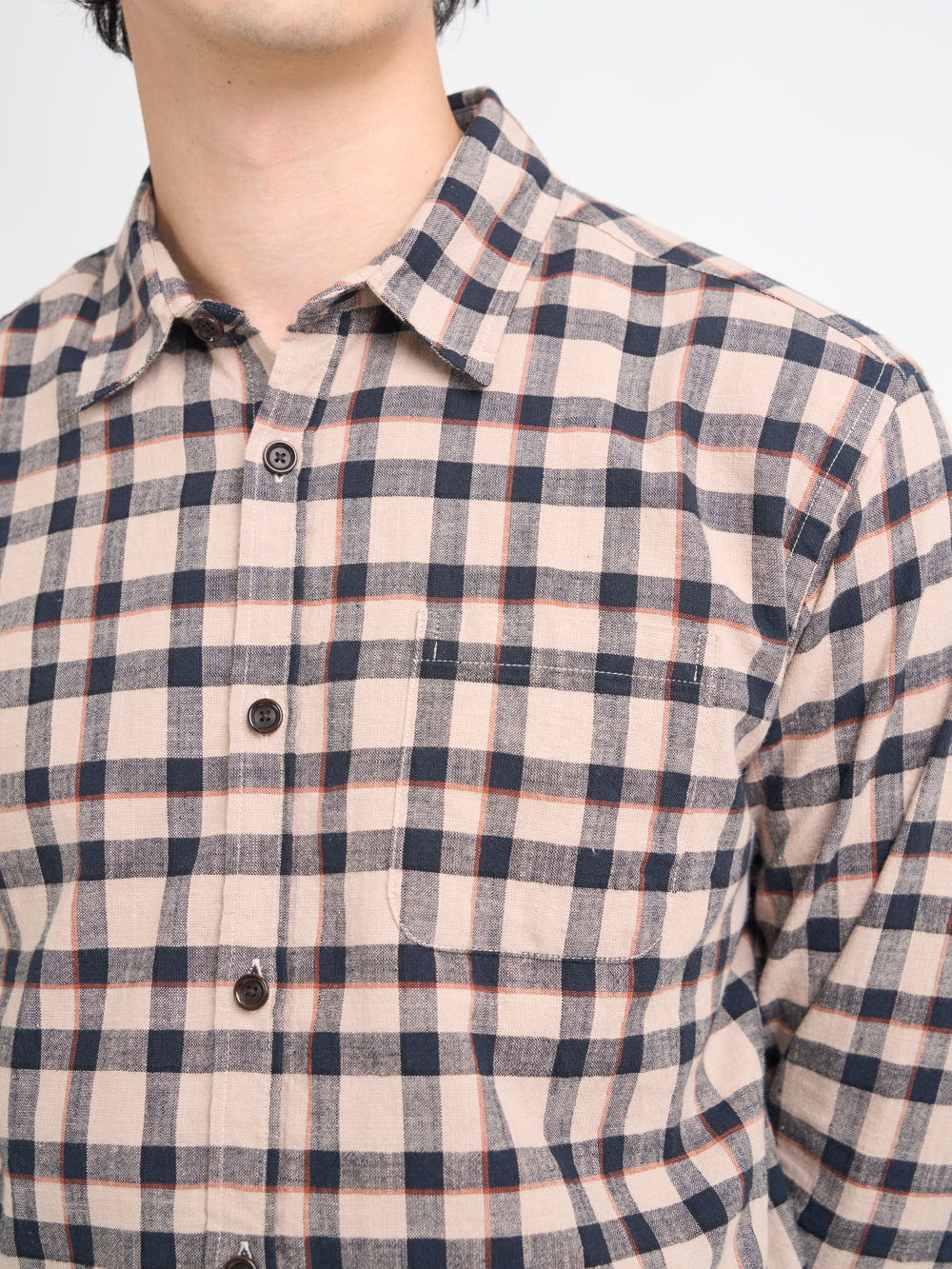 Closer shot of model wearing Oliver Spencer Walden Navy Spear Collar Organic Cotton Shirt