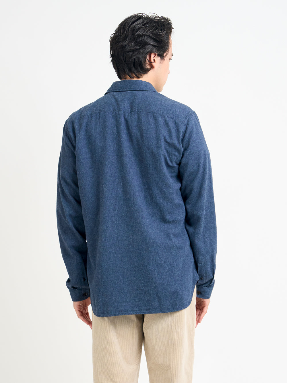 Close up back shot of model wearing Oliver Spencer Navy Spear Collar Cotton Shirt