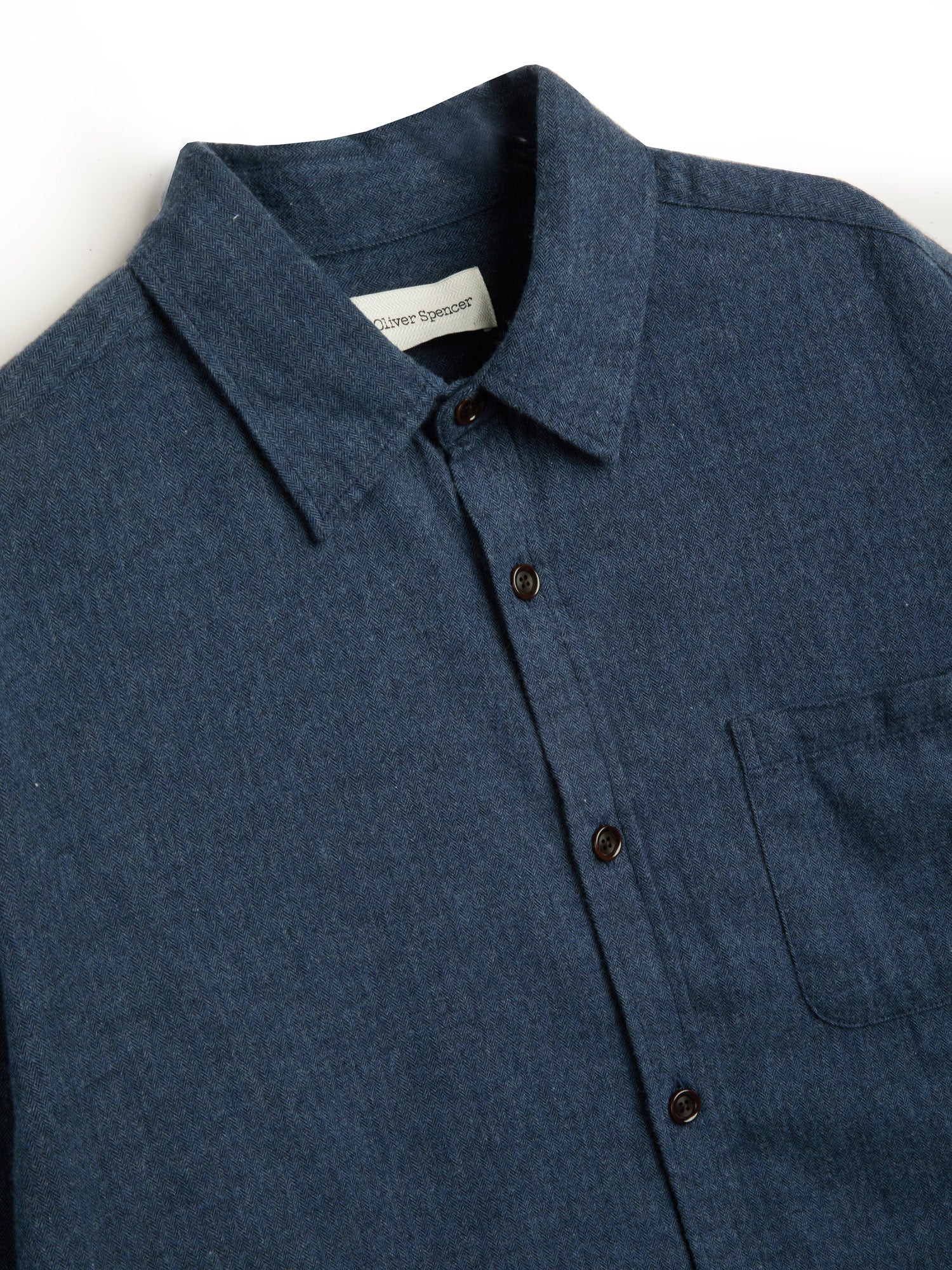 Close up collar shot of Oliver Spencer Navy Spear Collar Cotton Shirt